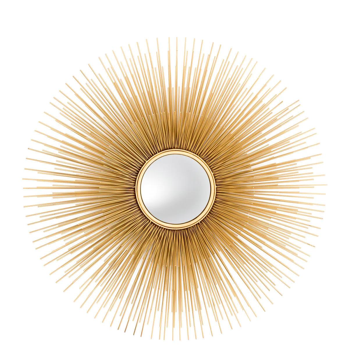 Sunburst Mirror, Gold-Plated Metal and Convex Mirror

This mirror, with its radiant sunburst silhouette, exudes timeless beauty.
Inspired by the radiant motifs that adorned the main gate of the Palace of Versailles in the 17th century, this convex