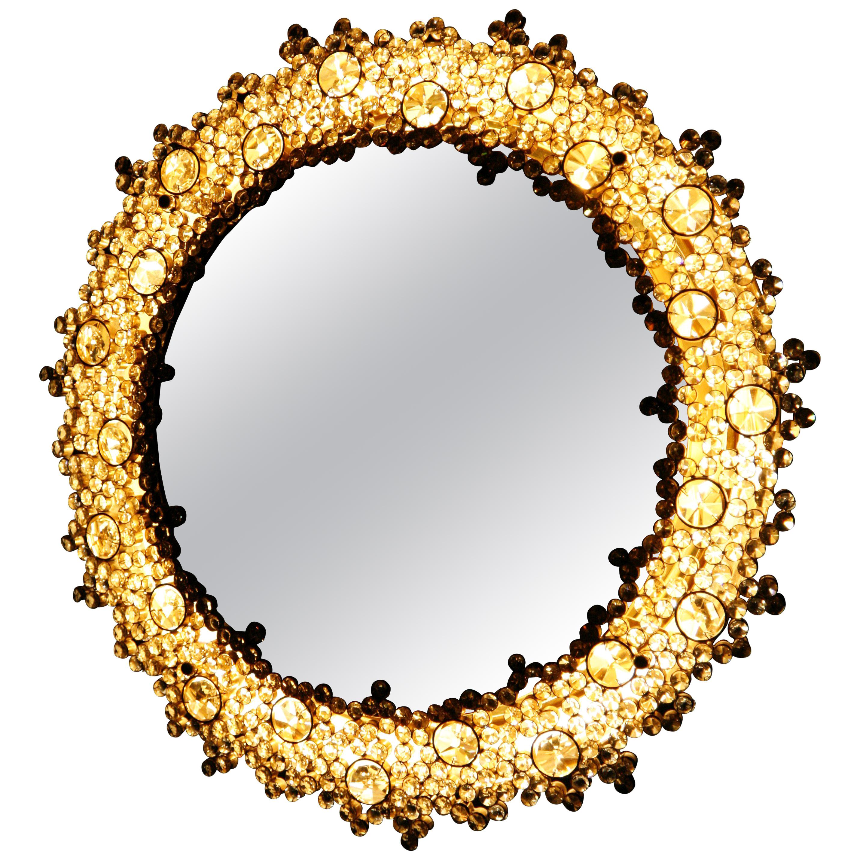 Sunburst mirror surrounded by a gold gilded frame that has numerous cut crystals in various sizes by Swarovski crystals Austria, it lights up the room like a fireplace it is the centerpiece for any room in the house.
The throughout detailed work