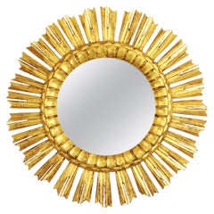 Miroir Sunburst en bois doré sculpté de style baroque, France, années 1930