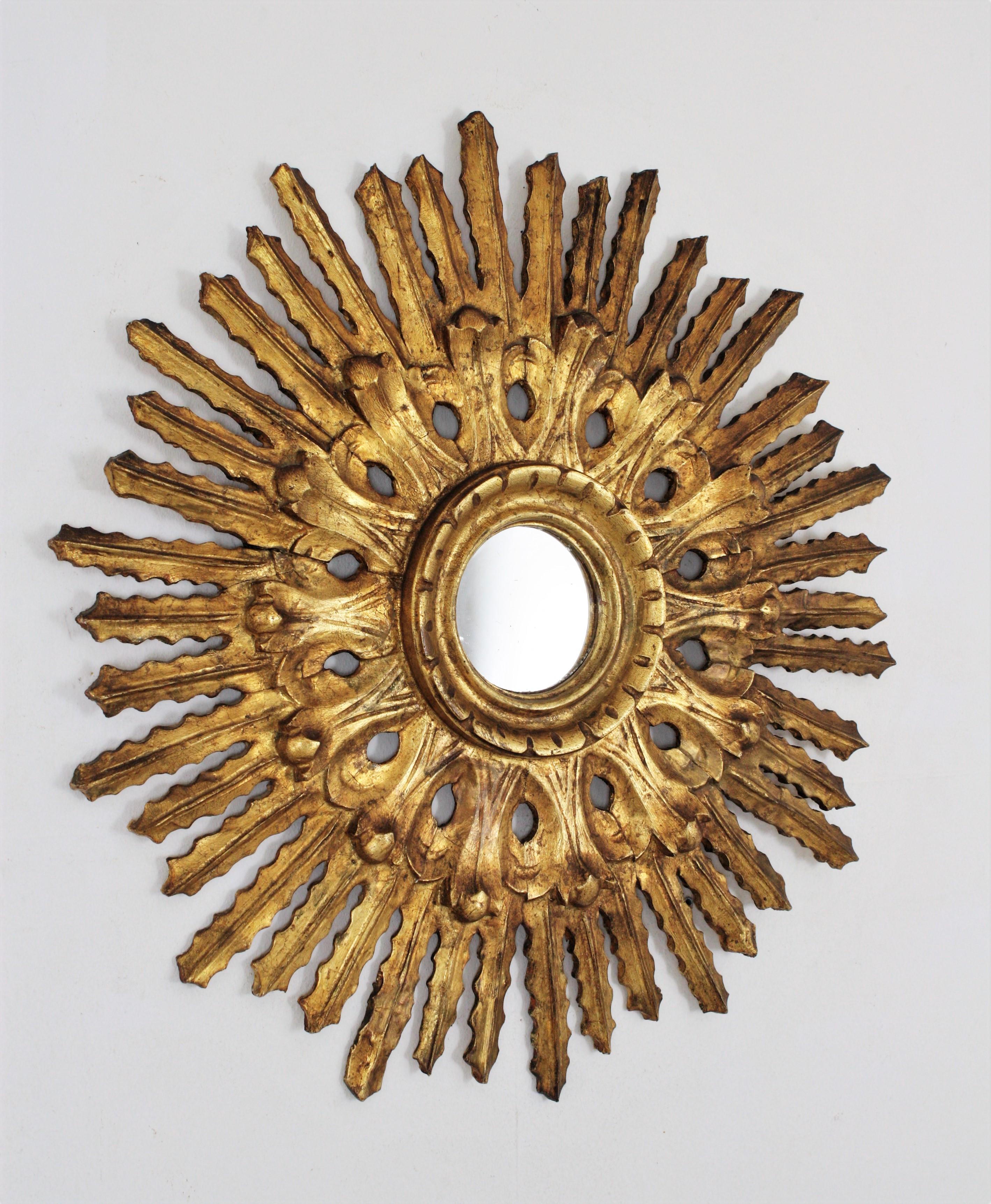 Sunburst Mirror in Carved Gold Leaf Giltwood and Baroque Style, Spain, 1920s 3