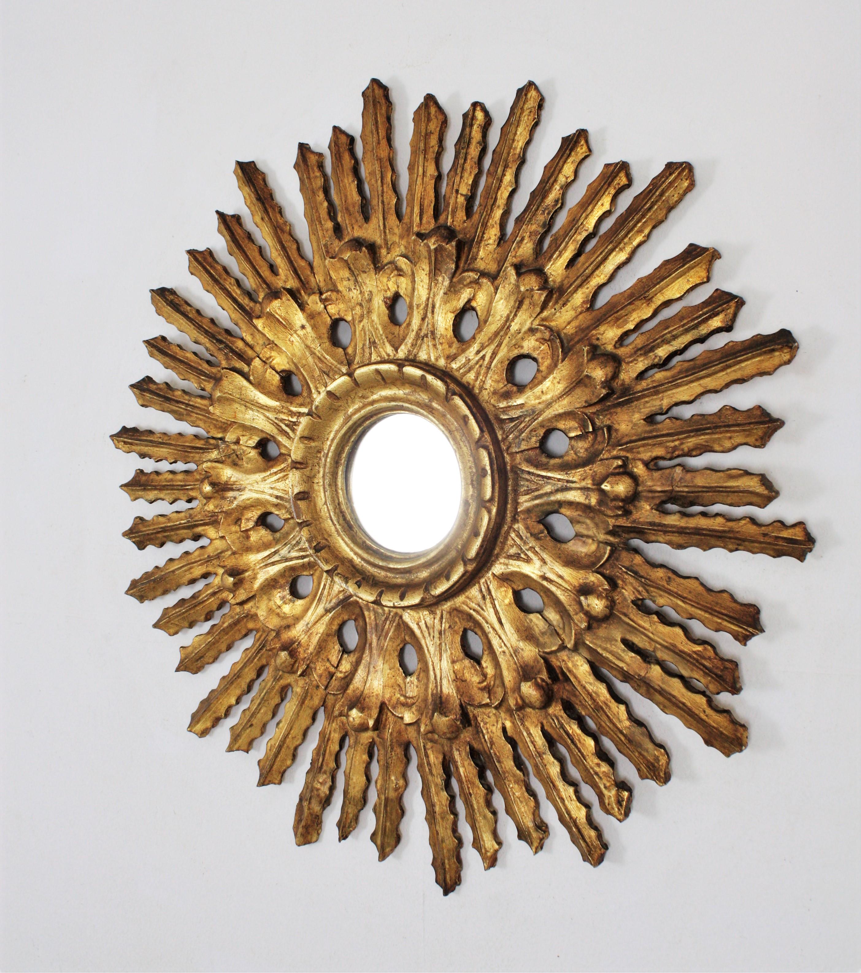 Sunburst Mirror in Carved Gold Leaf Giltwood and Baroque Style, Spain, 1920s 4