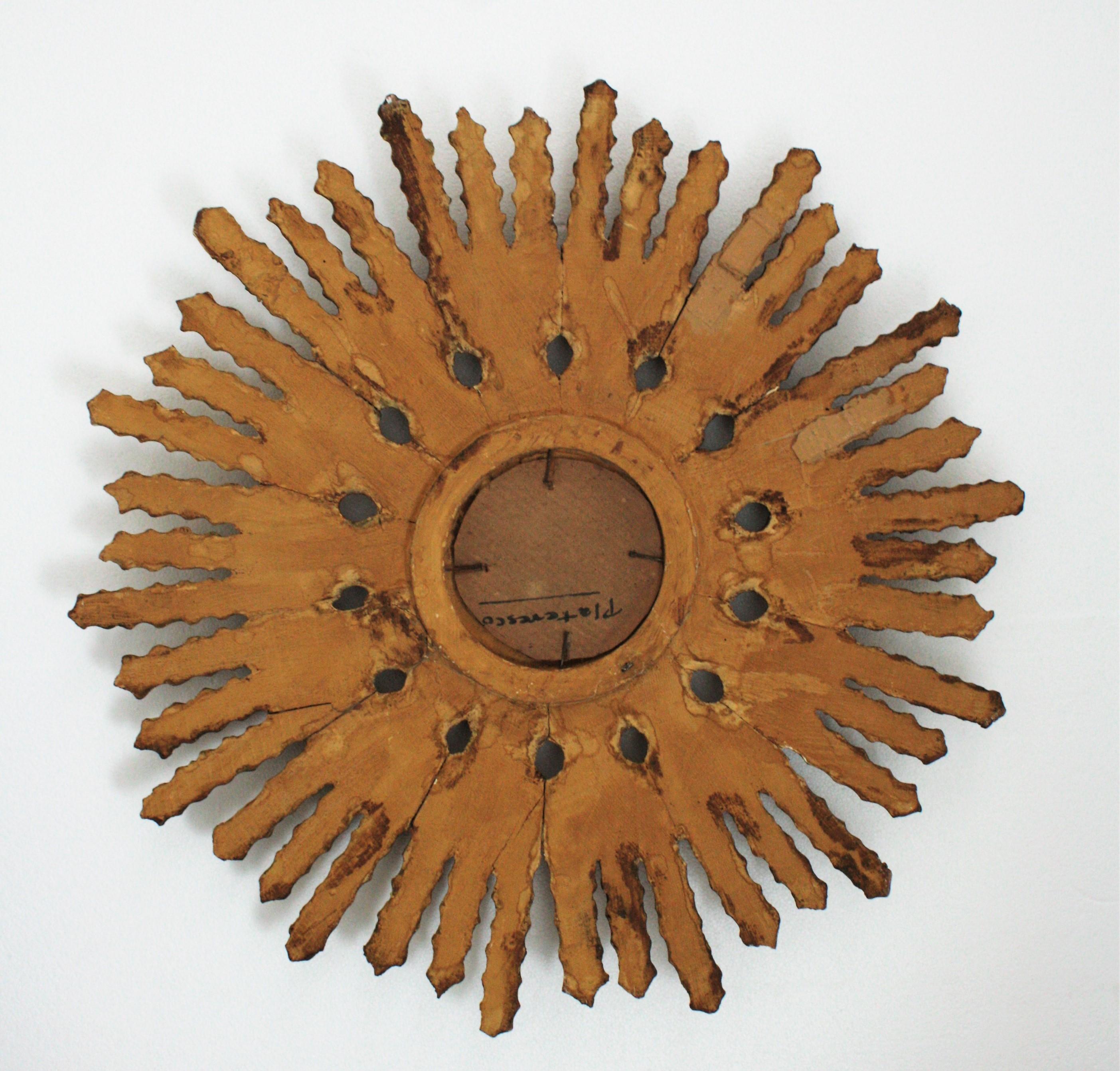 Sunburst Mirror in Carved Gold Leaf Giltwood and Baroque Style, Spain, 1920s 5