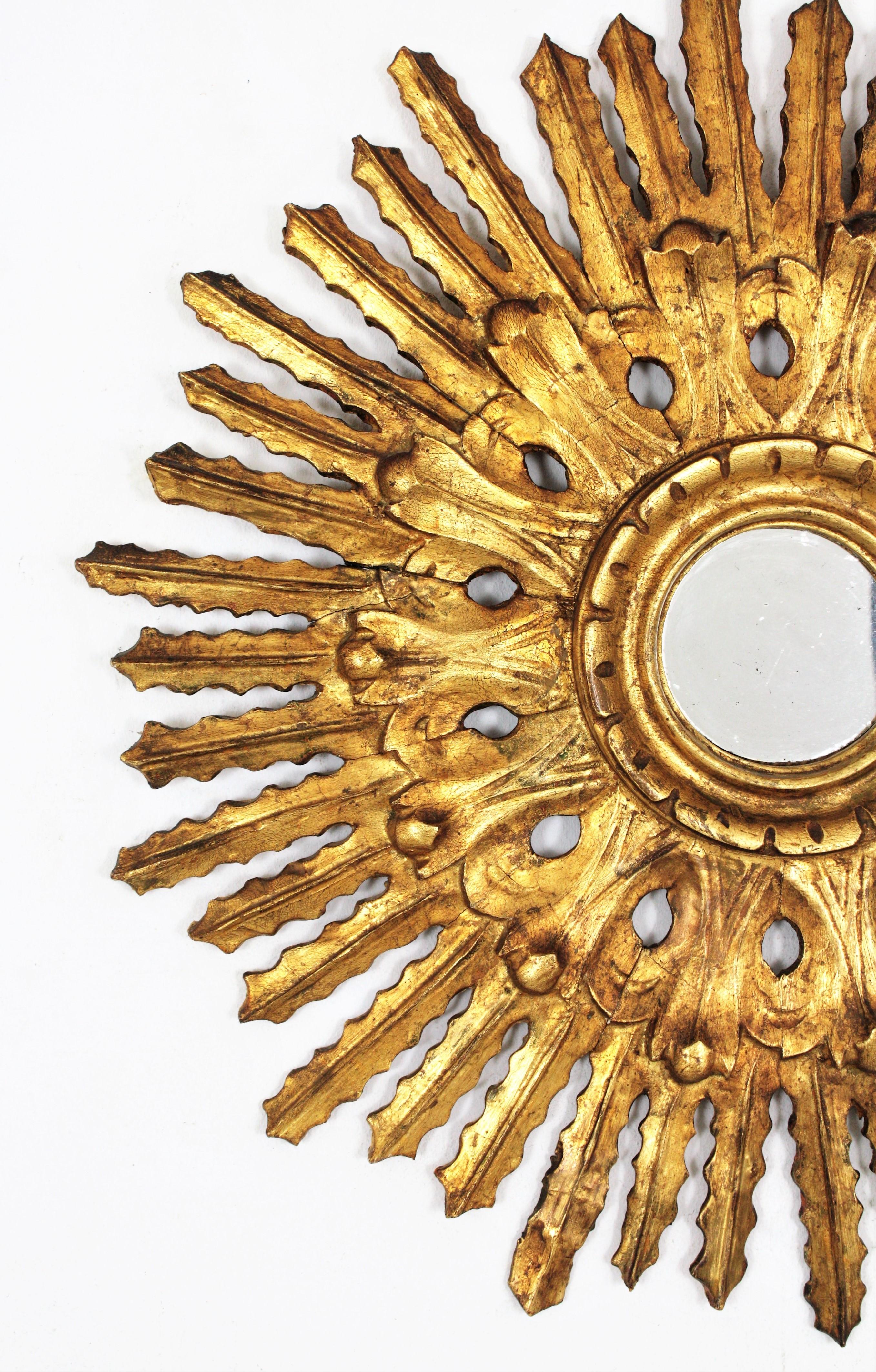 Hand-Carved Sunburst Mirror in Carved Gold Leaf Giltwood and Baroque Style, Spain, 1920s