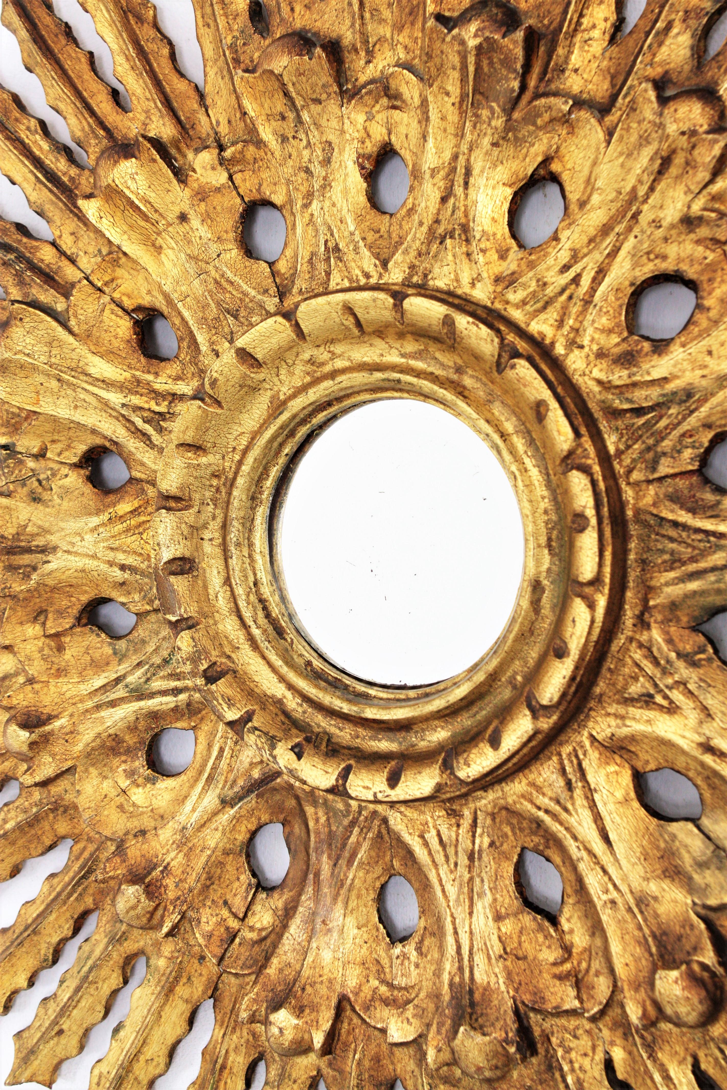 20th Century Sunburst Mirror in Carved Gold Leaf Giltwood and Baroque Style, Spain, 1920s