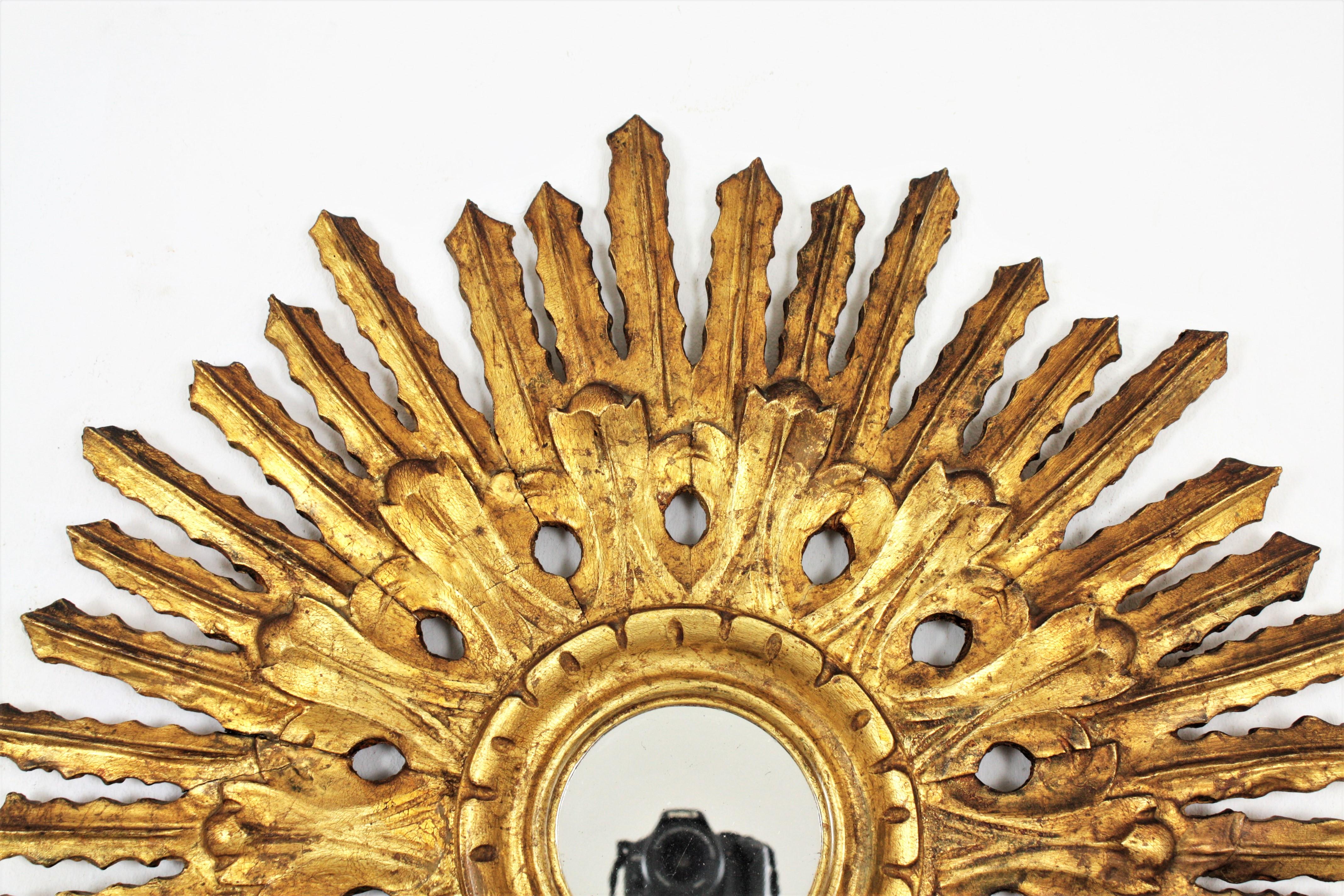 Wood Sunburst Mirror in Carved Gold Leaf Giltwood and Baroque Style, Spain, 1920s