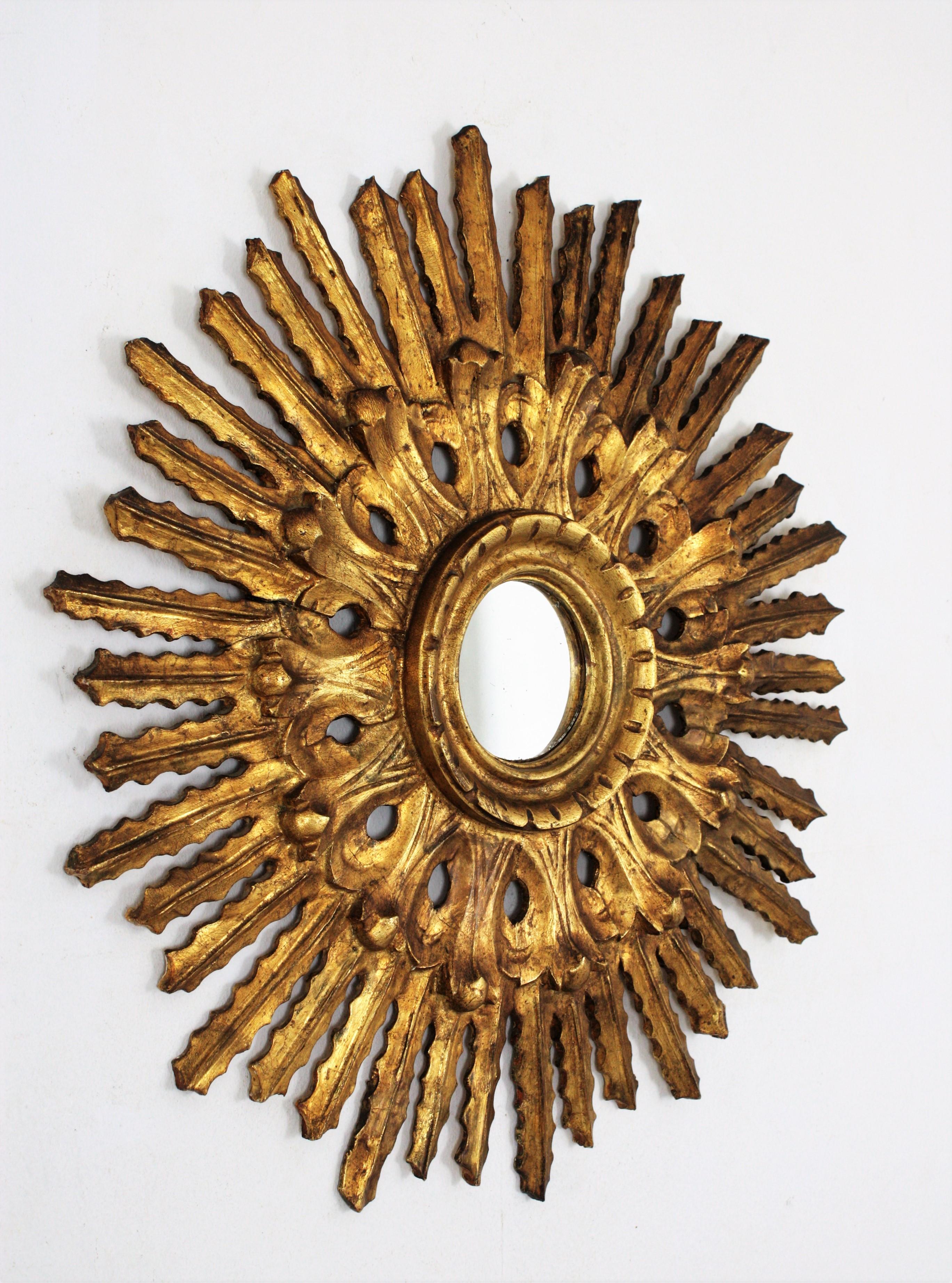 Sunburst Mirror in Carved Gold Leaf Giltwood and Baroque Style, Spain, 1920s 1