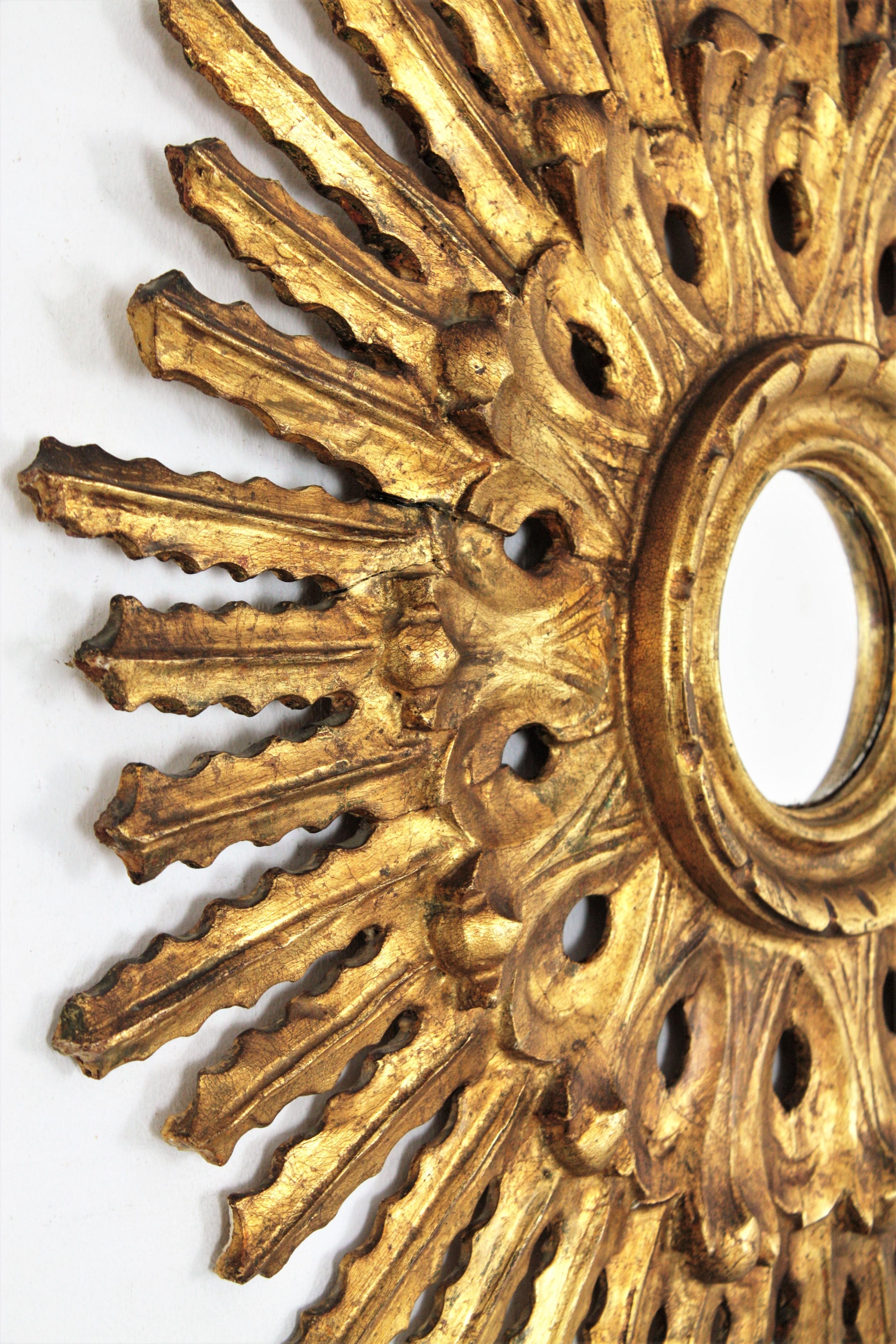 Sunburst Mirror in Carved Gold Leaf Giltwood and Baroque Style, Spain, 1920s 2
