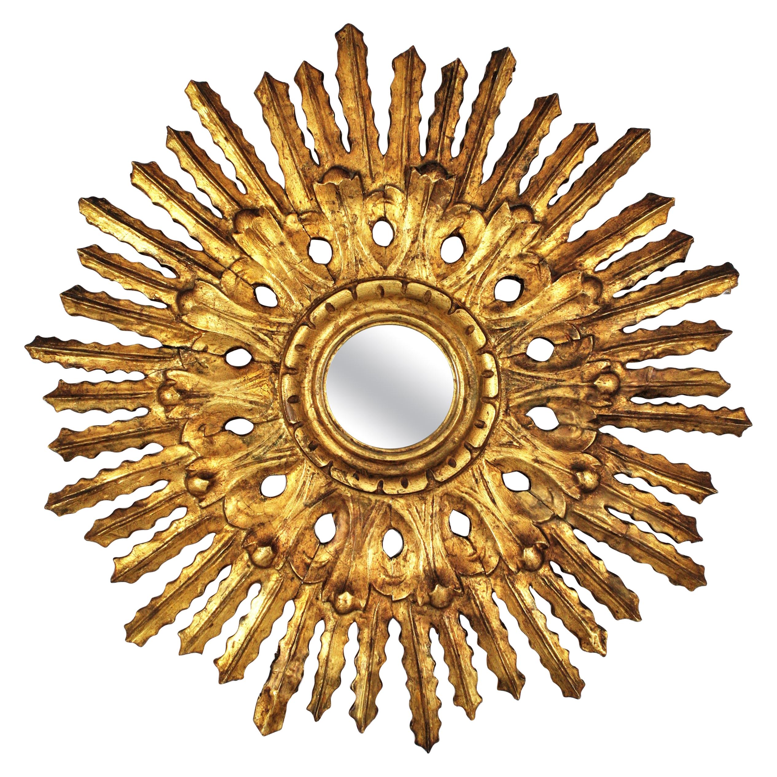 Sunburst Mirror in Carved Gold Leaf Giltwood and Baroque Style, Spain, 1920s