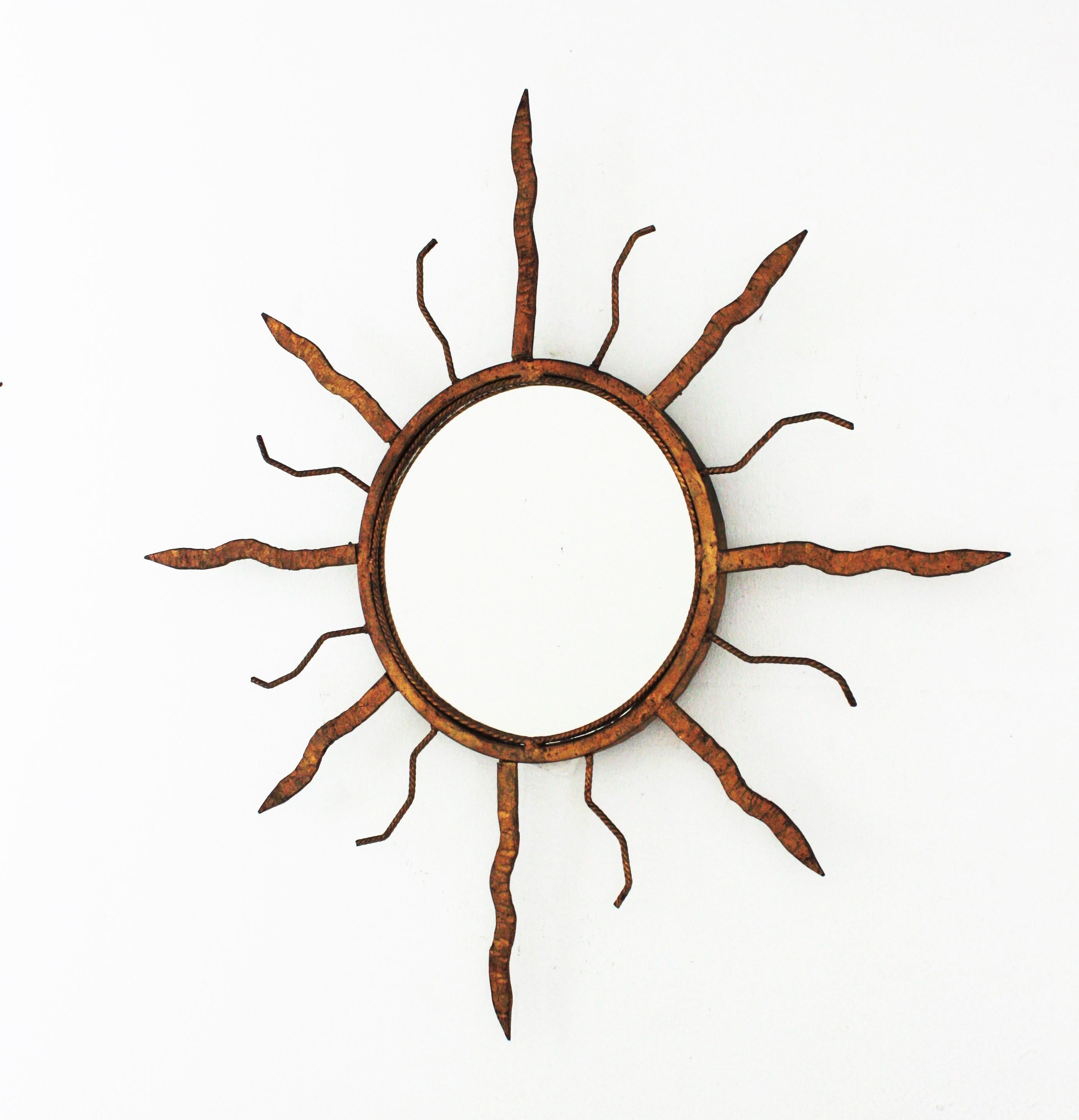 Forged Sunburst Mirror in Gilt Iron in the Style of Poillerat