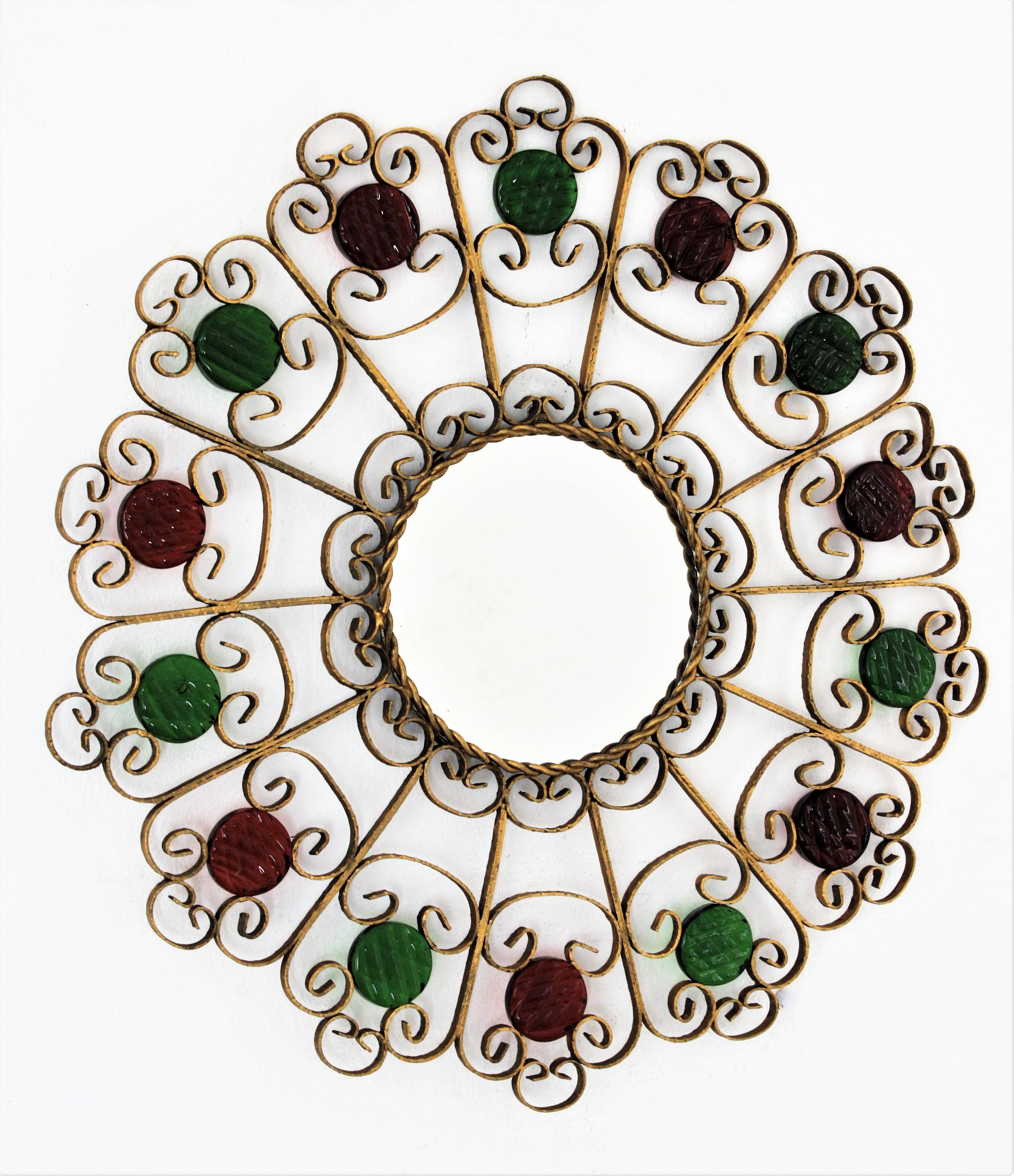 Hand-Crafted Sunburst Mirror in Gilt Metal and Red and Green Glass For Sale