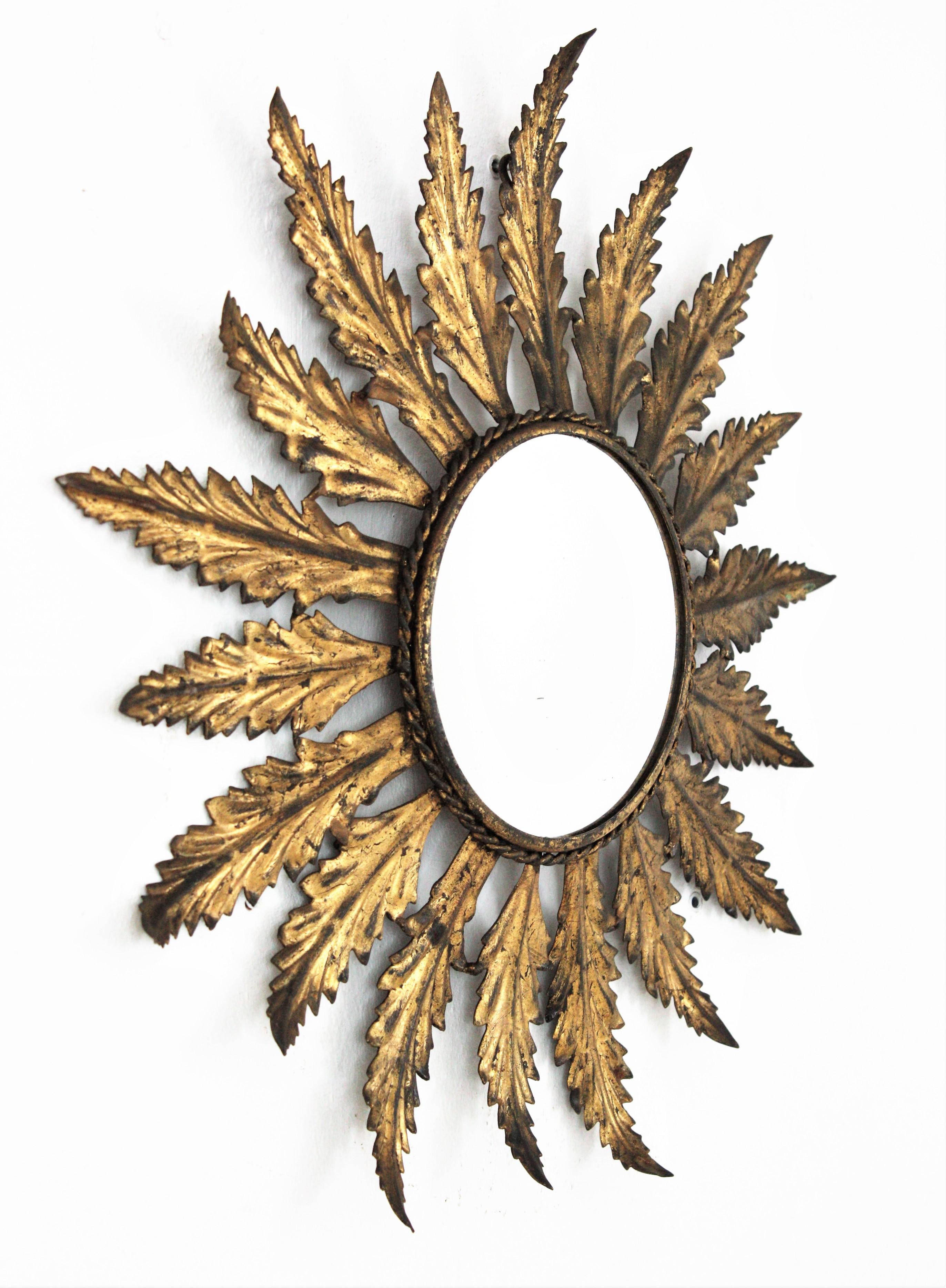 Spanish Sunburst Mirror in Gilt Metal with Leaf Design, Spain, 1950s For Sale