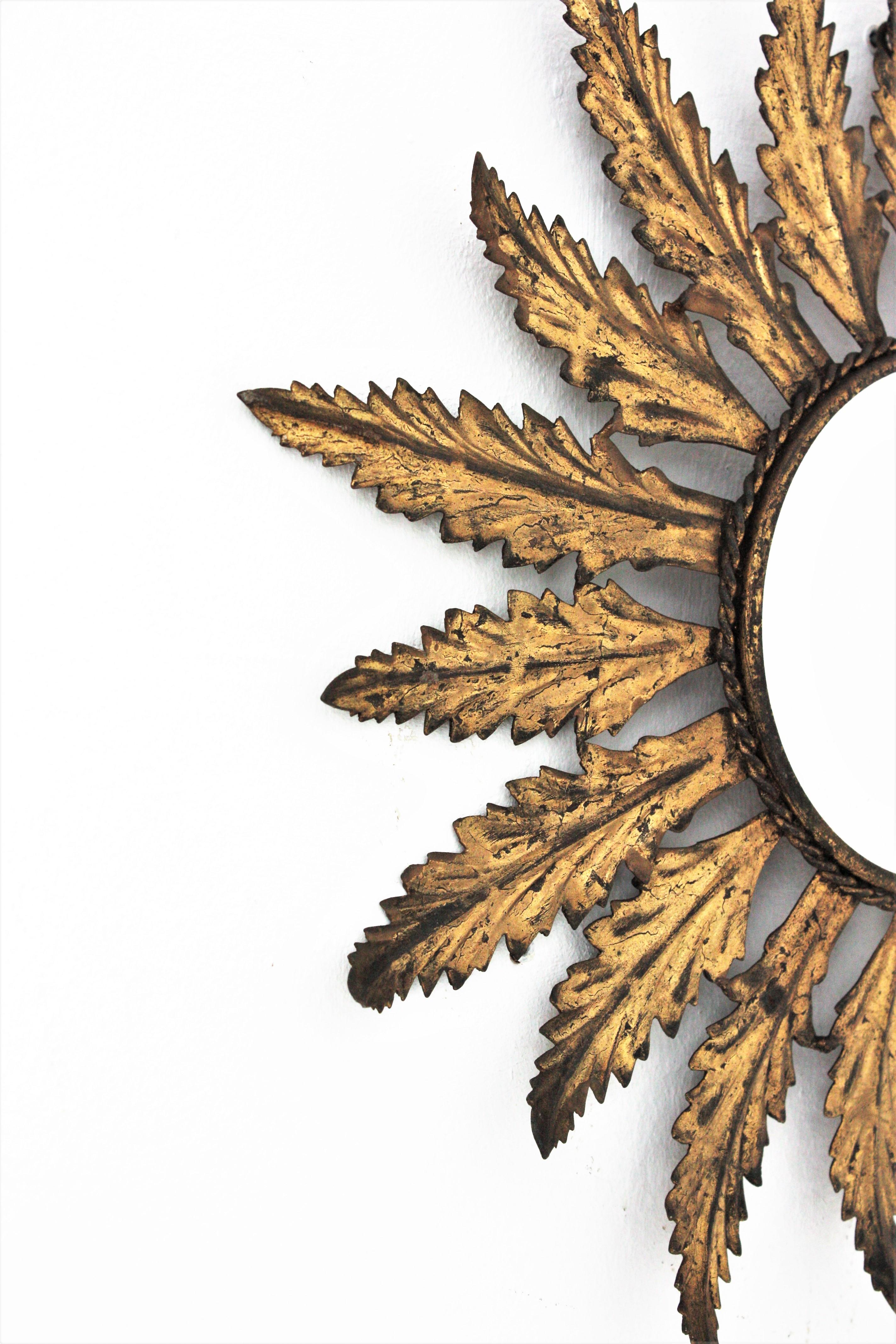 Sunburst Mirror in Gilt Metal with Leaf Design, Spain, 1950s In Good Condition For Sale In Barcelona, ES