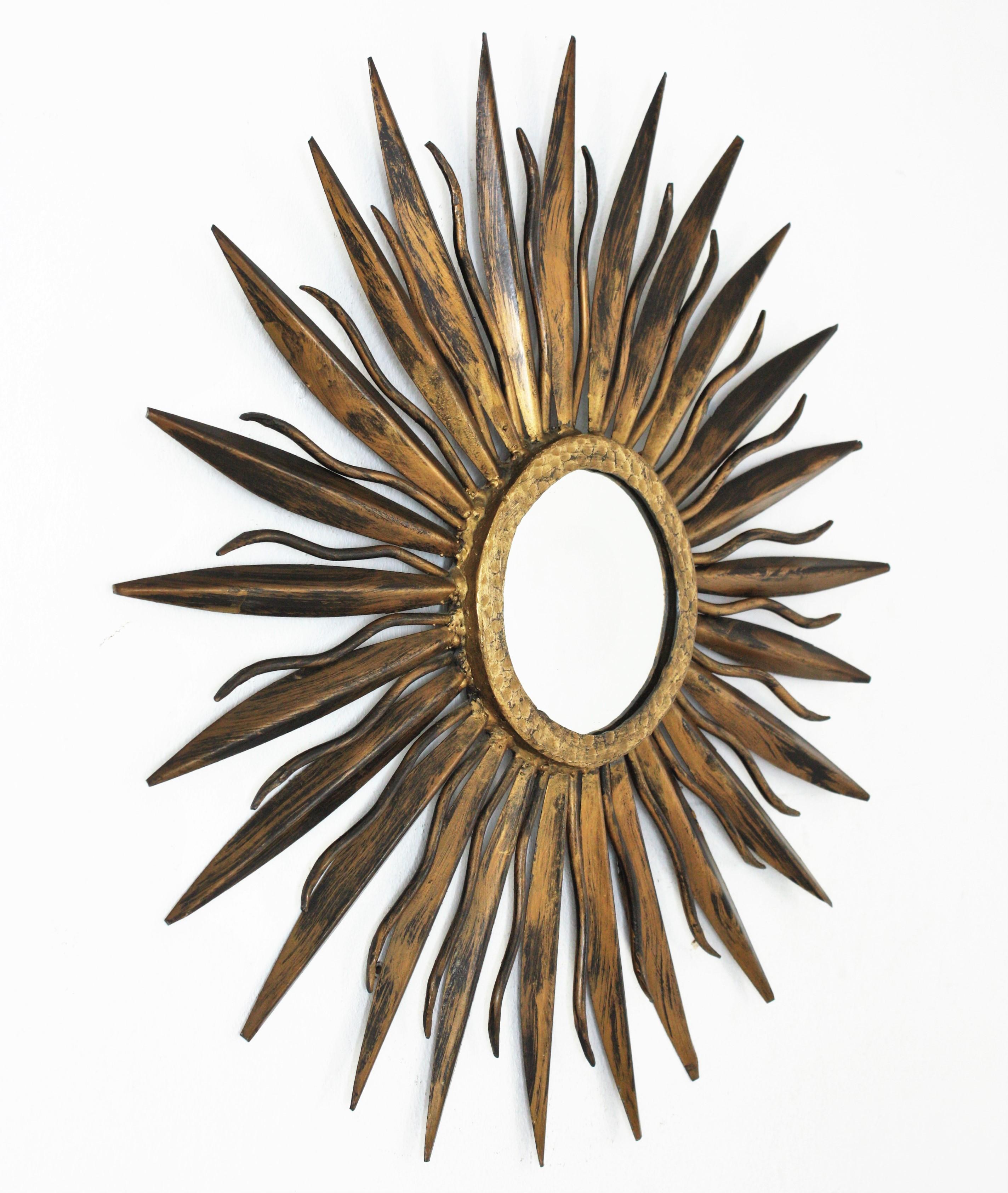 Spanish Sunburst Mirror in Gilt Wrought Iron, 1940s For Sale