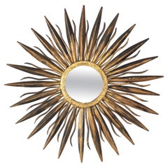 Sunburst-Spiegel aus vergoldetem Schmiedeeisen, 1940er Jahre