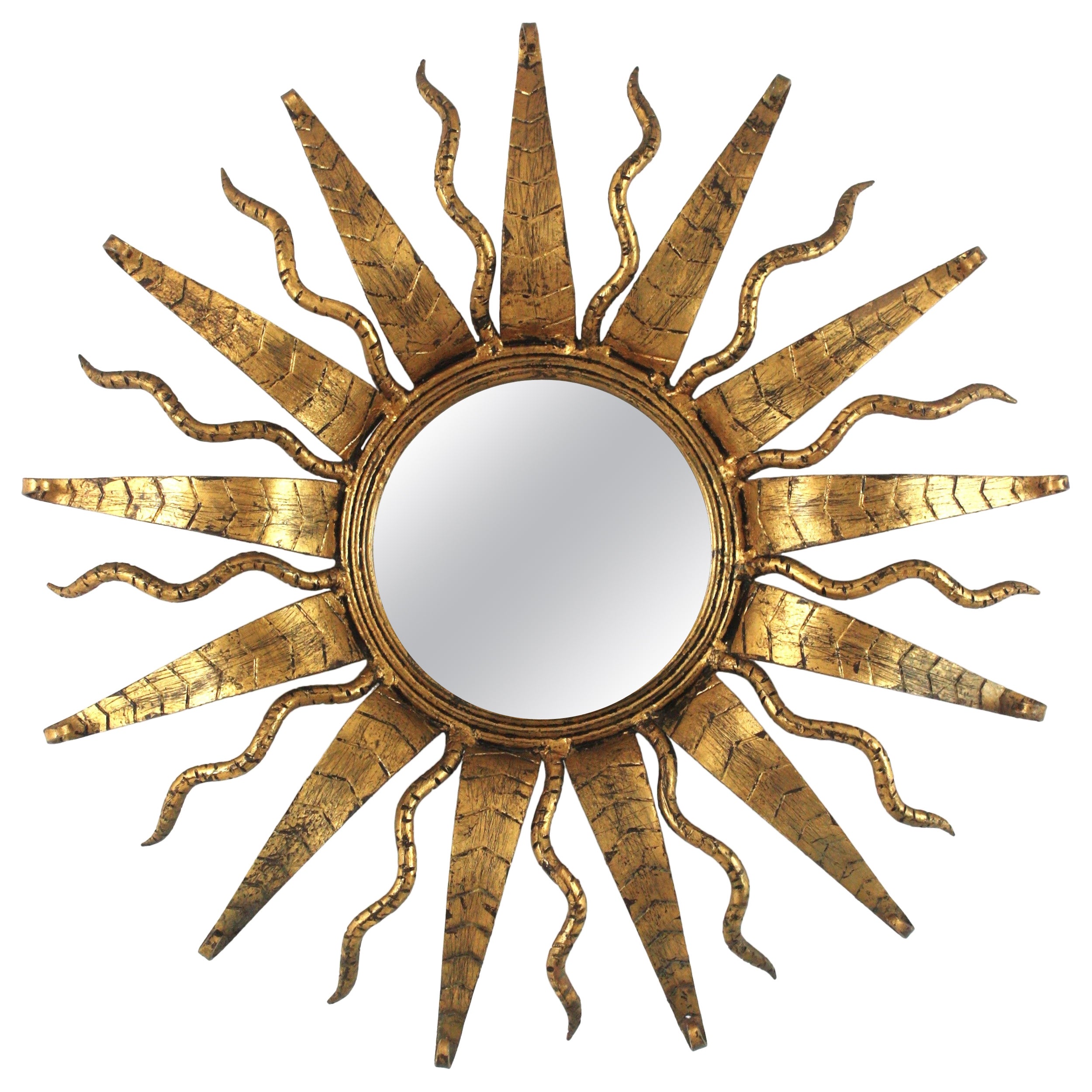 Espejo Sunburst en hierro forjado dorado, España Años 50 en venta