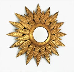 Hollywood Regency Sunburst Mirror in Gilt Iron