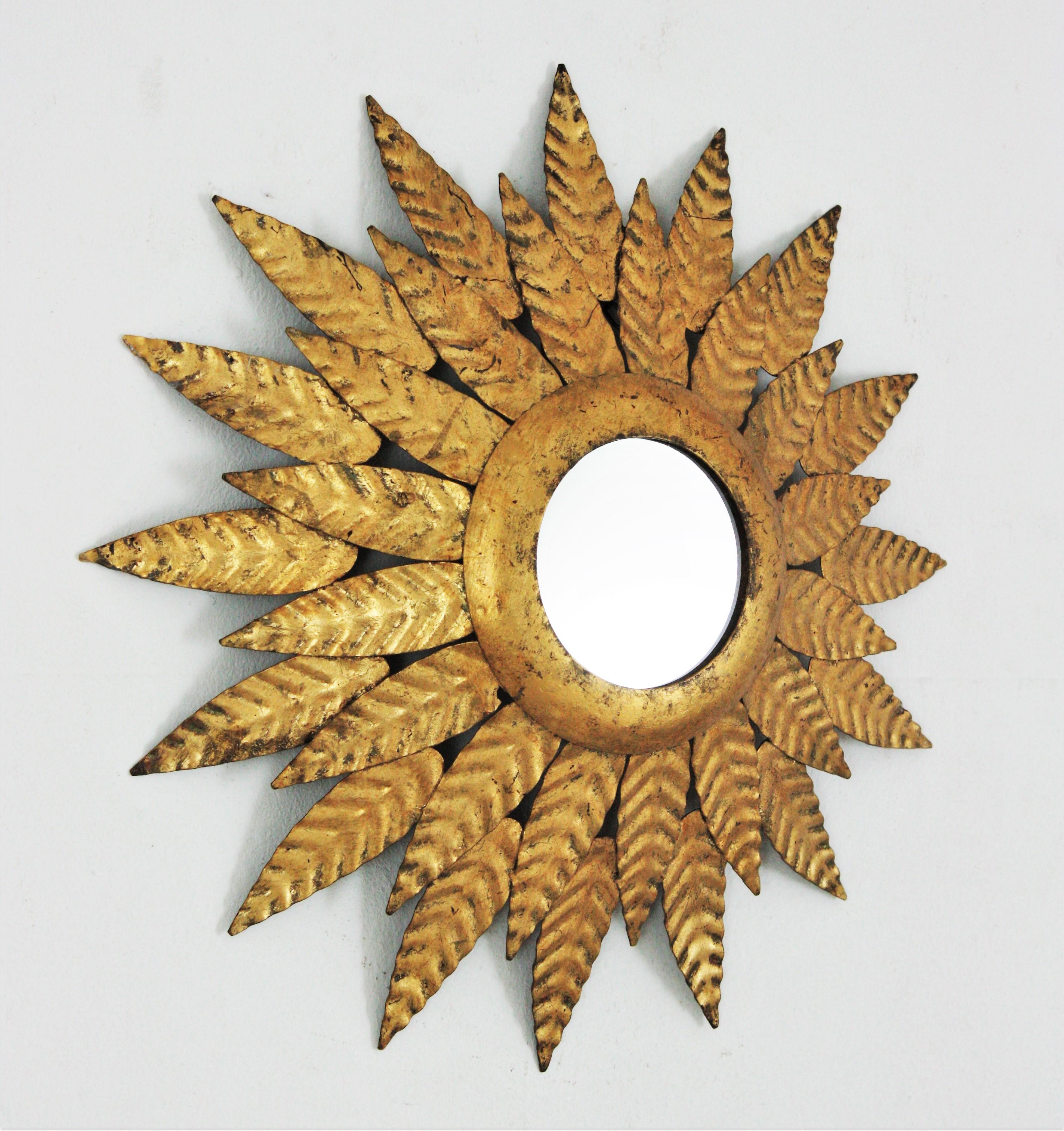 Spanish Hollywood Regency Sunburst Mirror in Gilt Iron For Sale