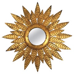 Retro Hollywood Regency Sunburst Mirror in Gilt Iron