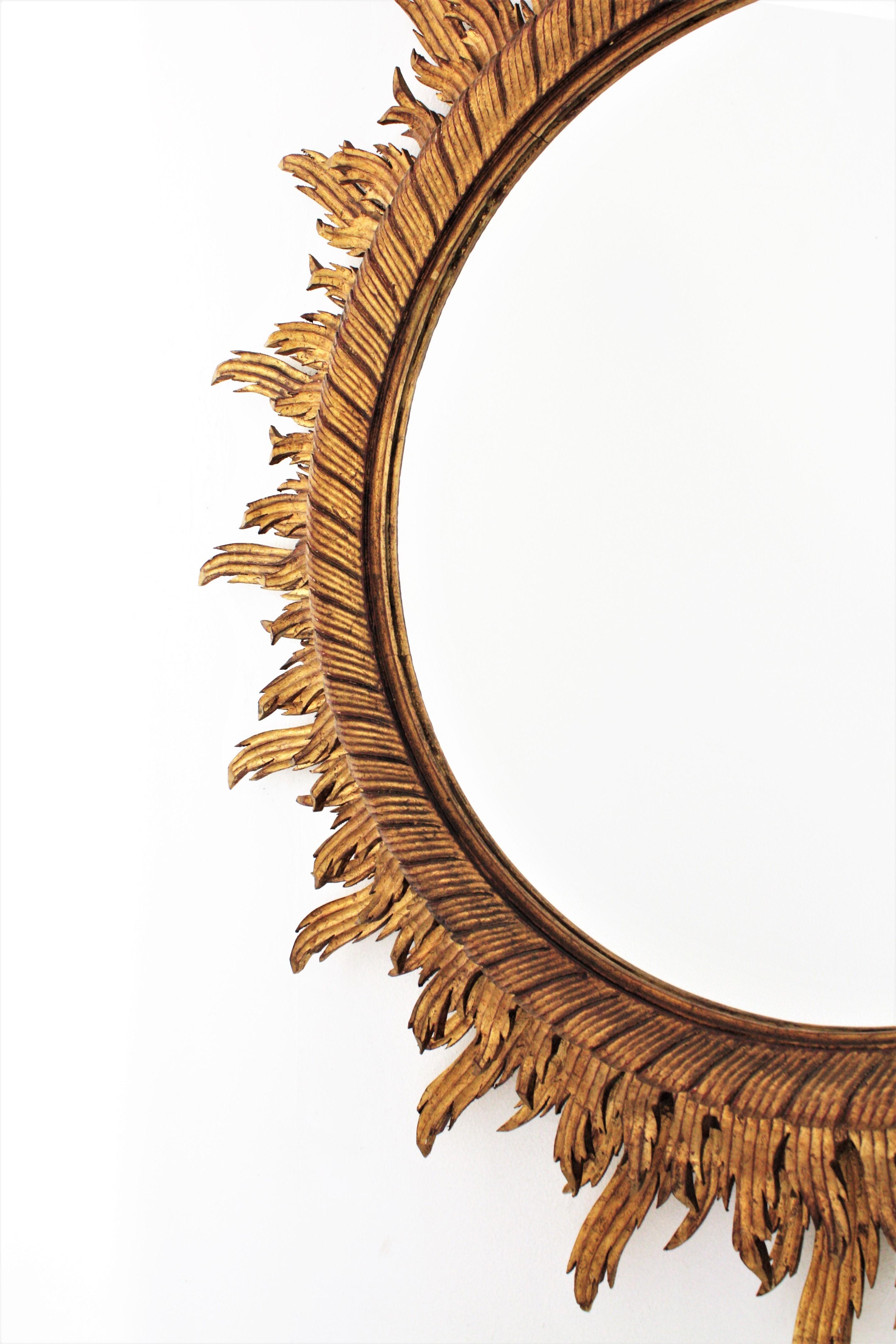 Oversized Gilt Sunburst Mirror in Carved Wood, 52 inches For Sale 5