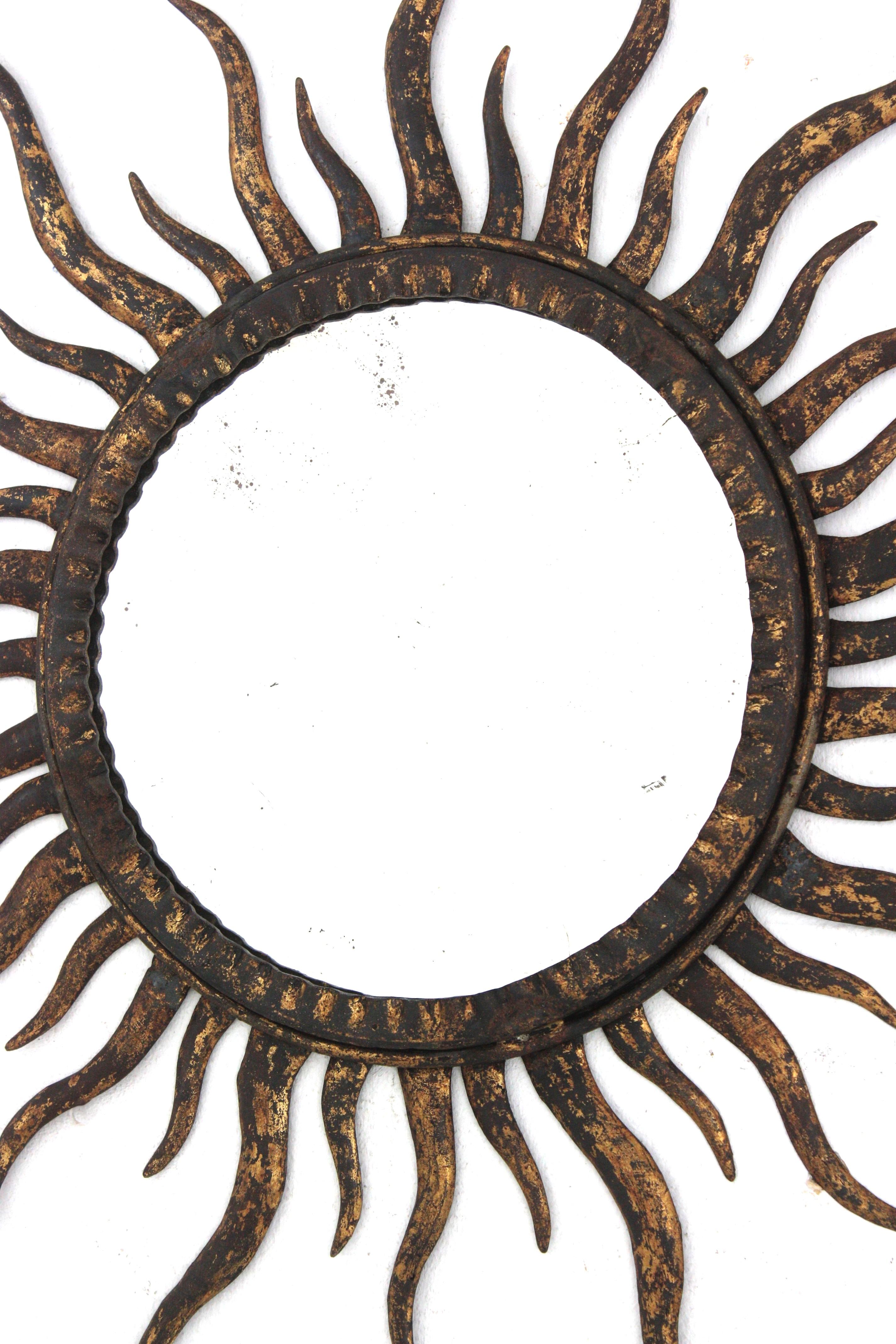 20th Century Sunburst Mirror in the Style of Gilbert Poillerat, Gilt Metal For Sale