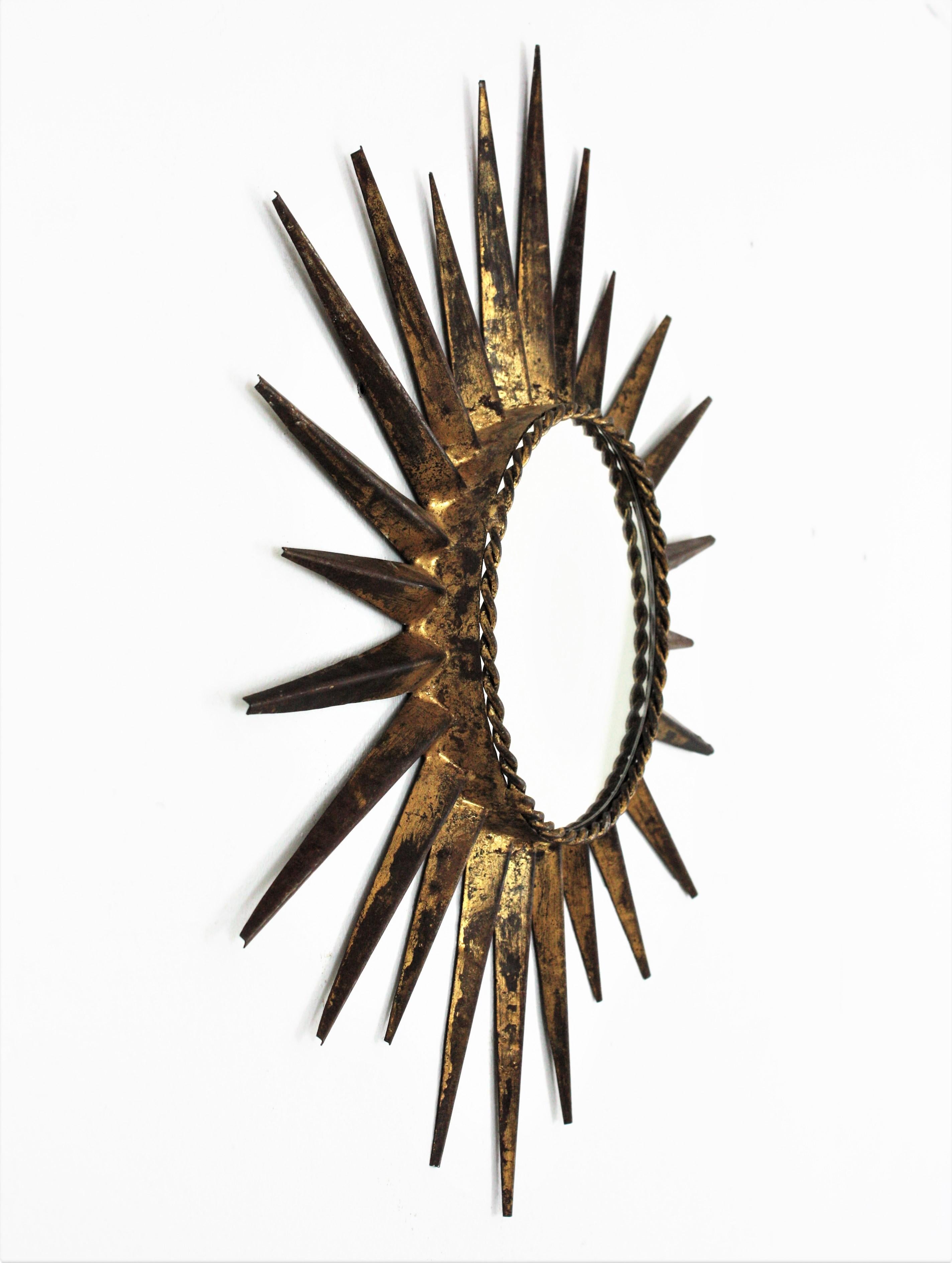 Brutalist Sunburst Mirror in the Style of Gilbert Poillerat, Gilt Wrought Iron