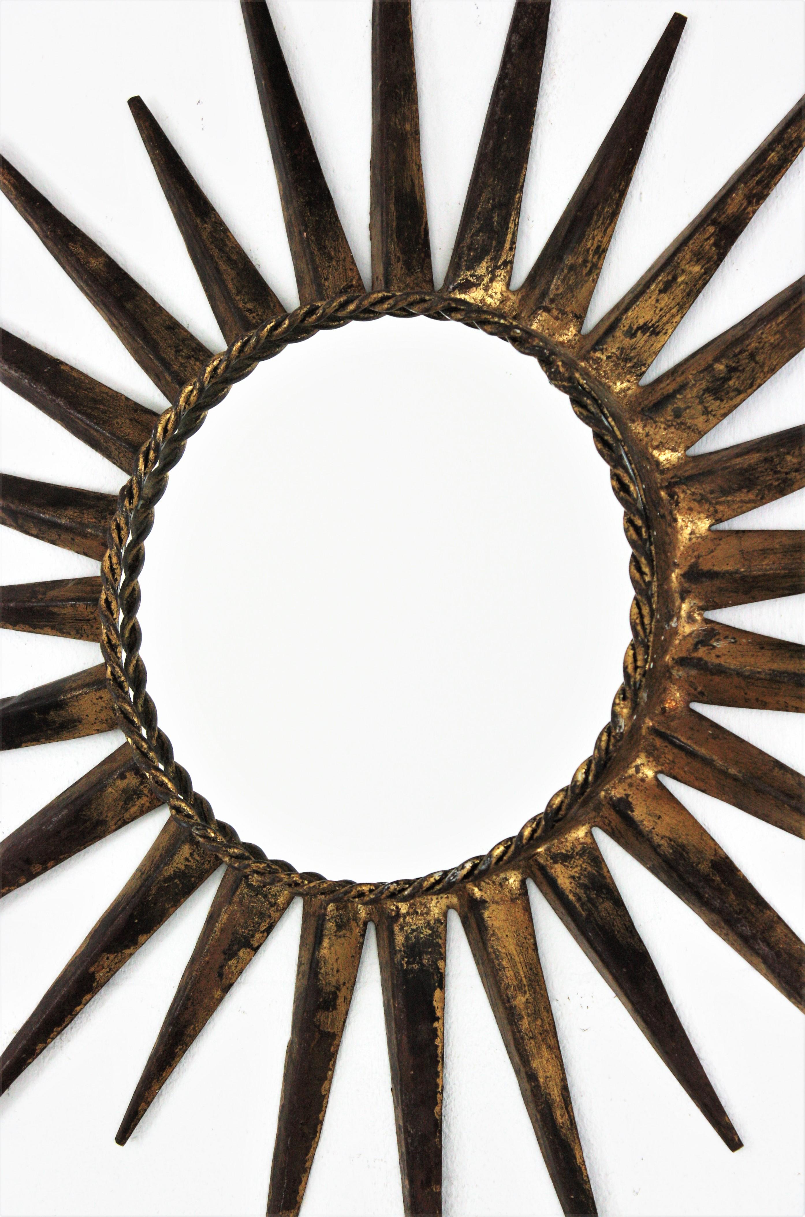 Gold Leaf Sunburst Mirror in the Style of Gilbert Poillerat, Gilt Wrought Iron