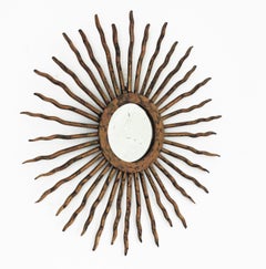Hand Forged Sunburst Mirror in Gilt Patinated Iron, 1940s French Designer