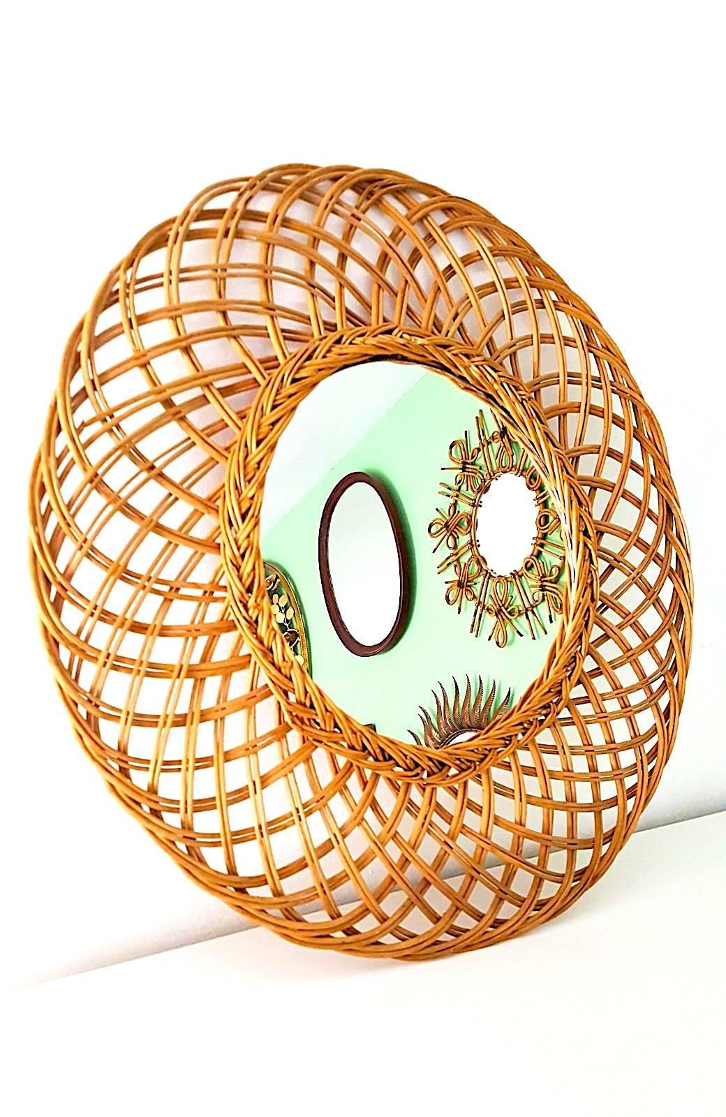 Lovely handcrafted rattan sunburst shape details.
This piece has all the taste of the Saint Tropez Riviera Mediterranean coast style and it is in excellent vintage condition.
South France Riviera, 1950s.
Beautiful to place in a wall decoration