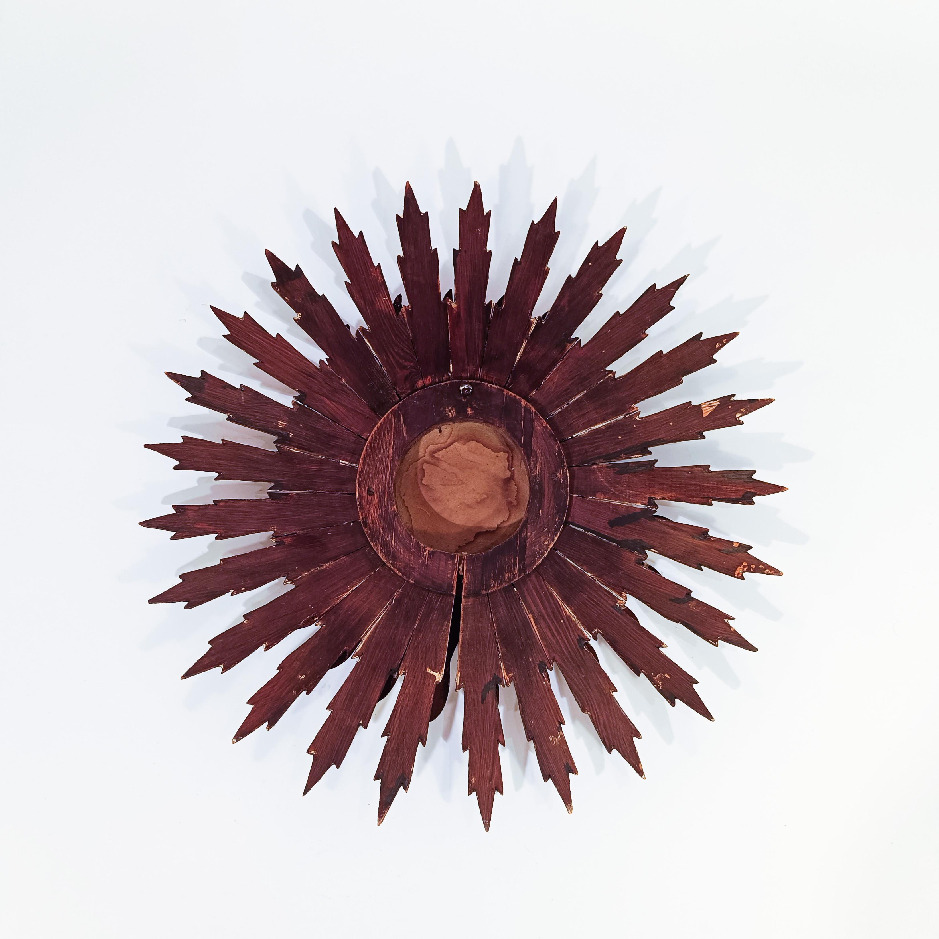 Mid-20th Century Sunburst mirror with gold and silver leaf, France, 1950s For Sale