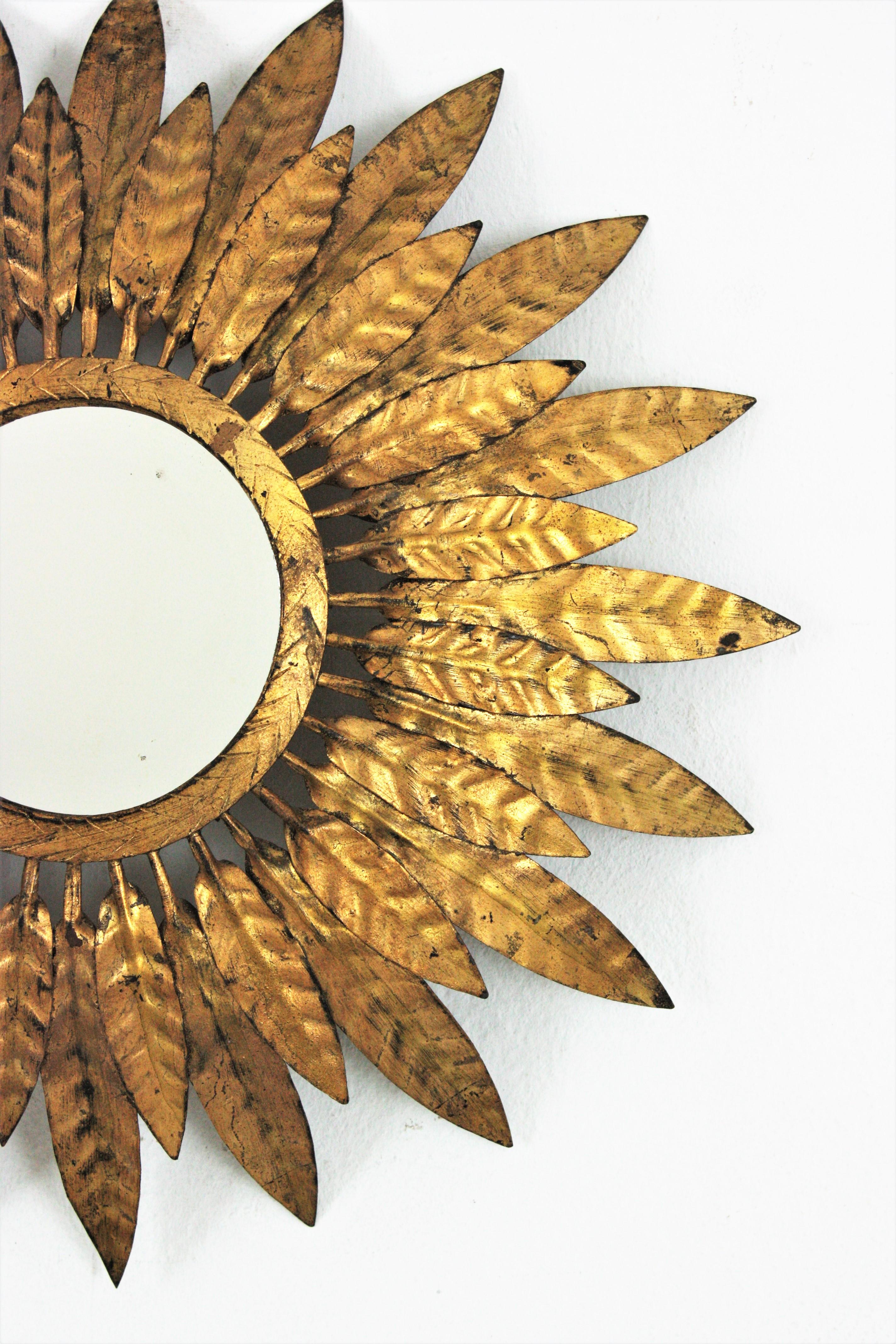 Hammered Sunburst Mirror with Leafed Frame, Gilt Iron For Sale