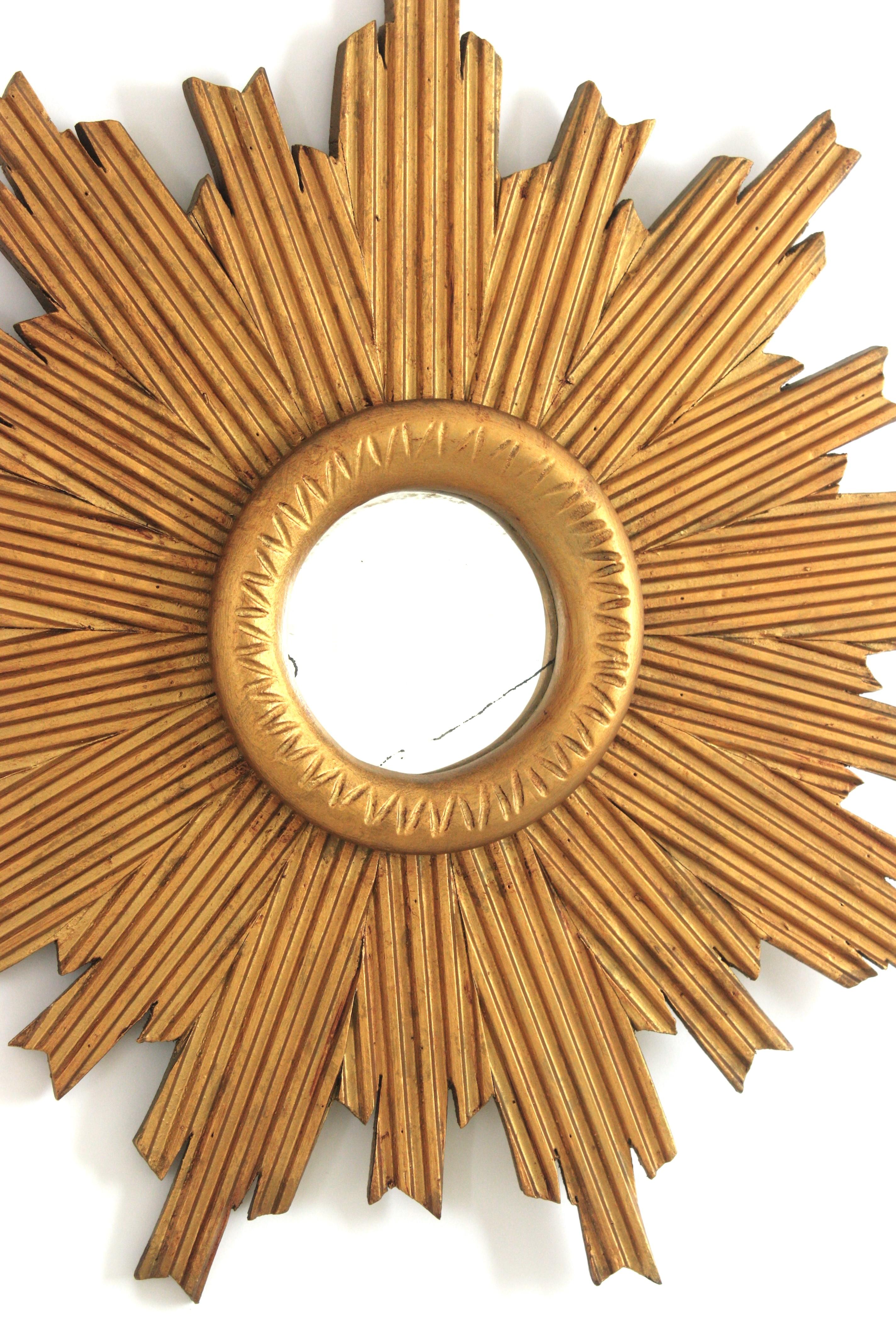Mid-Century Modern Sunburst Mirror with Striped Frame in Giltwood For Sale