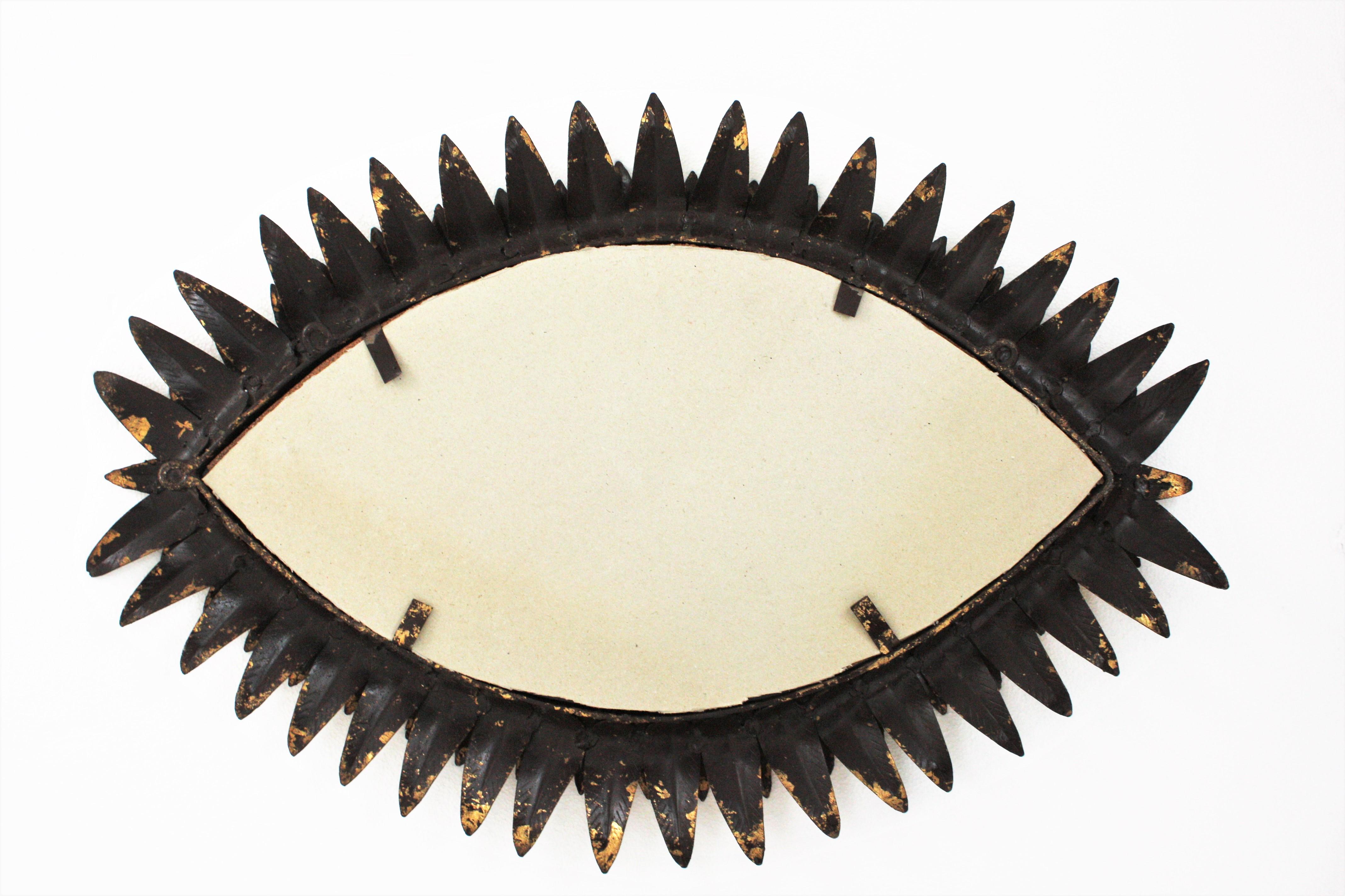 Sunburst Oval Eye Shaped Mirror in Gilt Iron For Sale 4