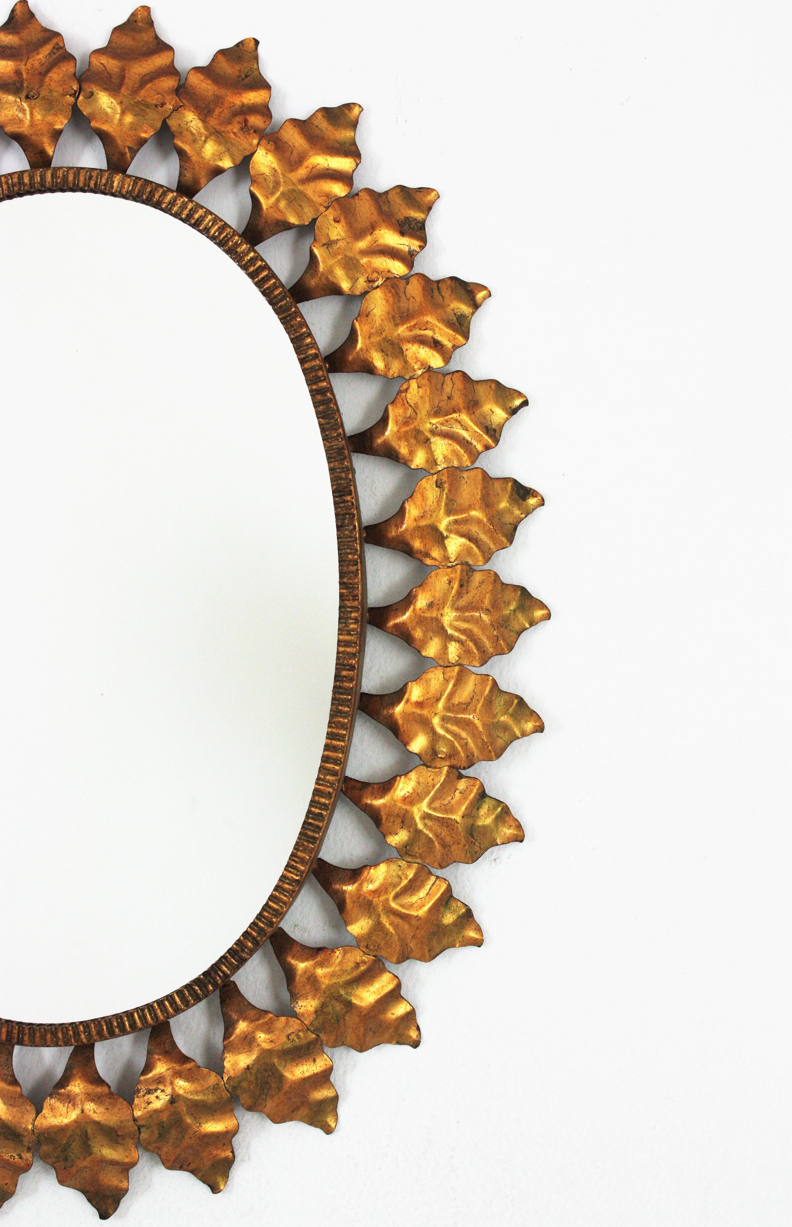Metal Sunburst Oval Mirror in Gilt Iron