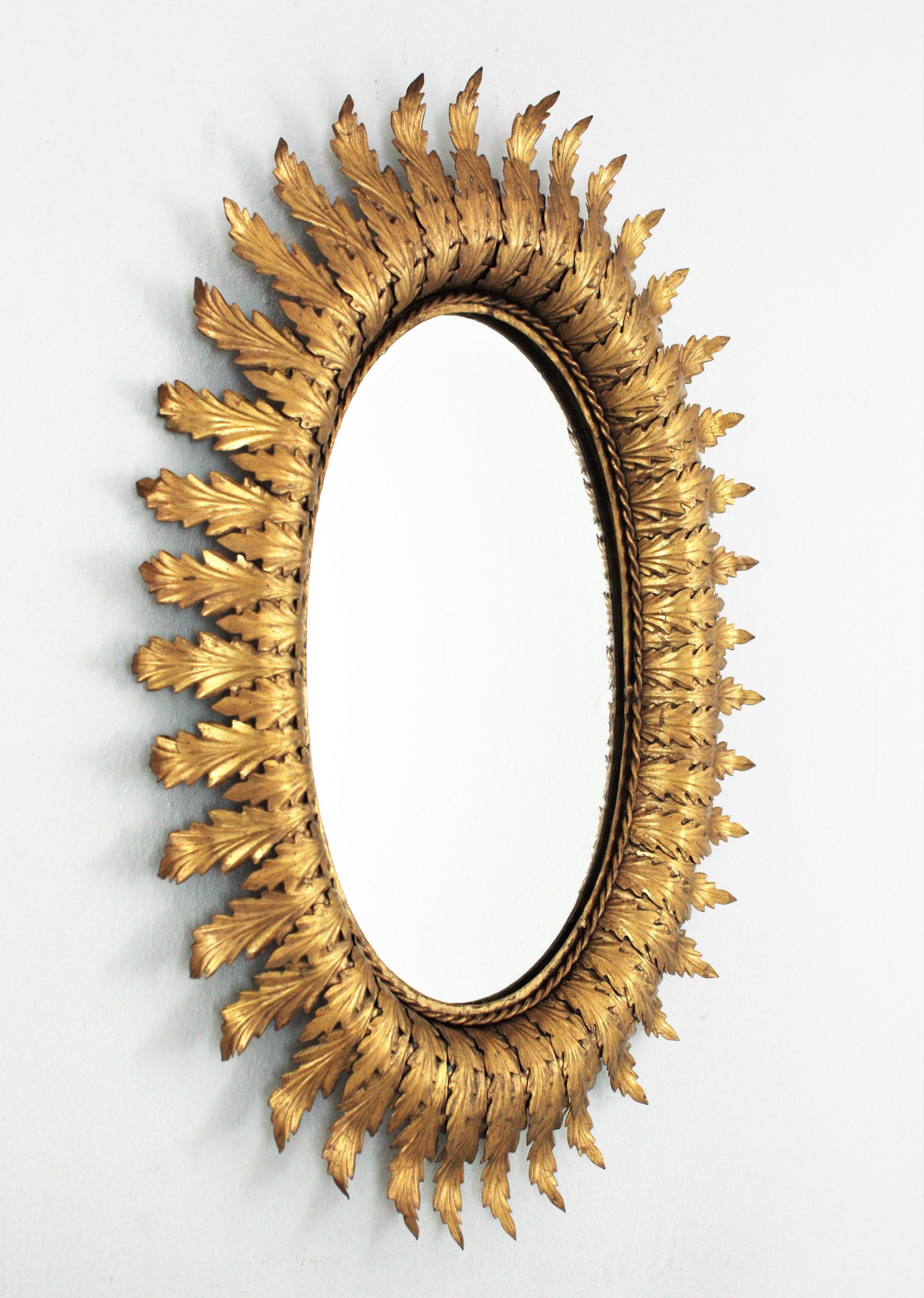 Mid-Century Modern Sunburst Oval Mirror in Gilt Metal, 1950s For Sale