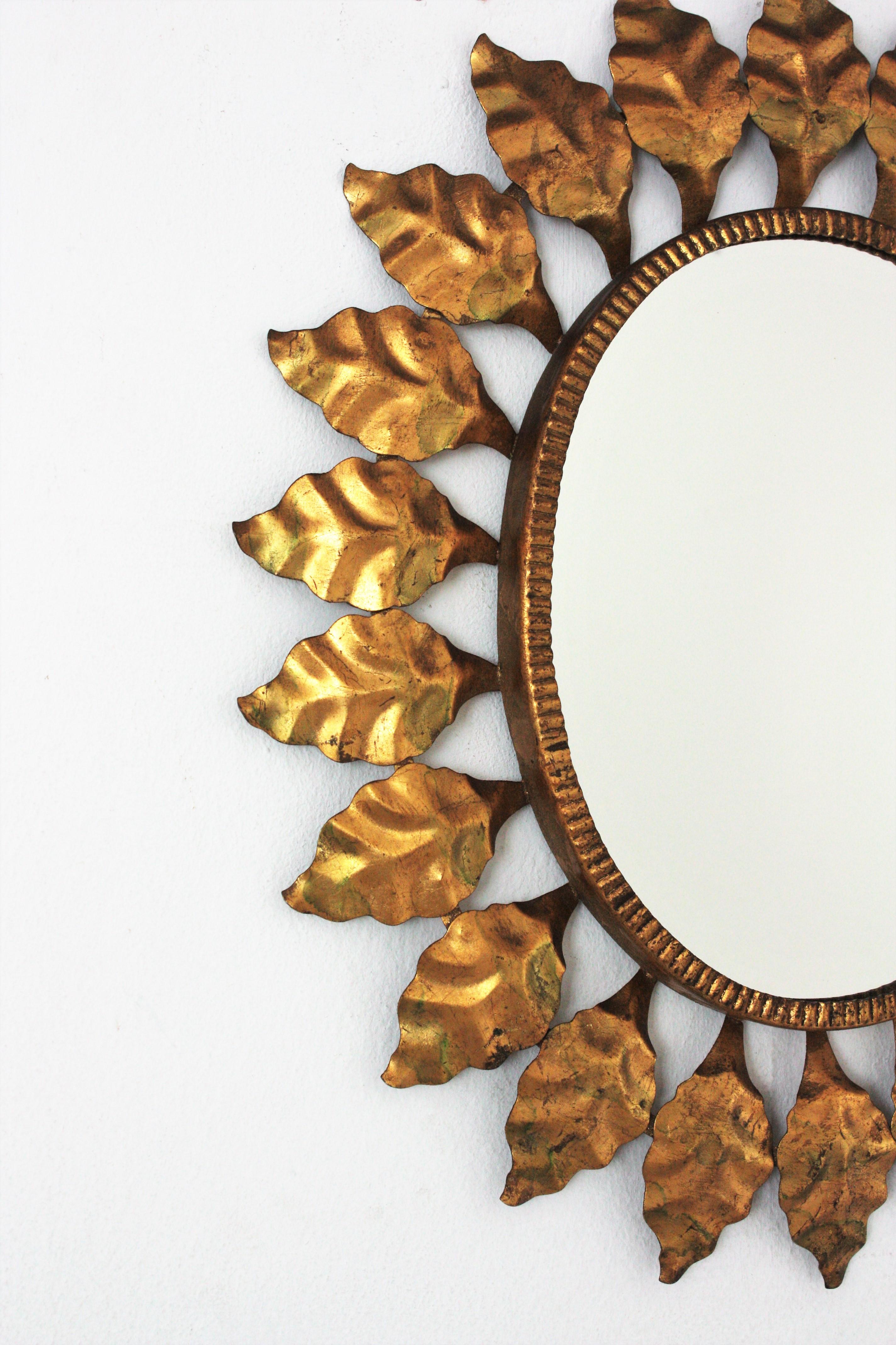 20th Century Sunburst Oval Mirror in Gilt Metal, 1950s For Sale