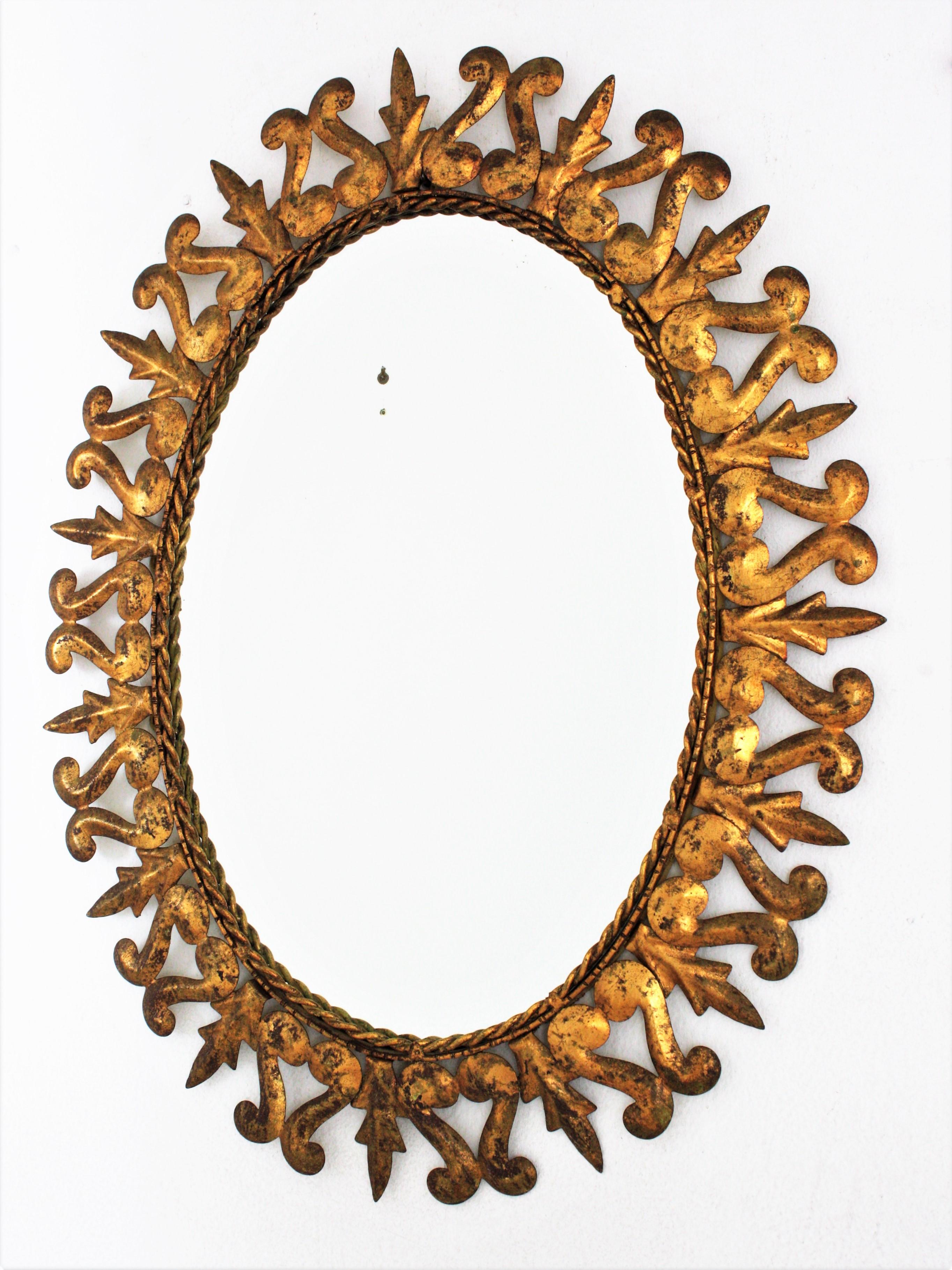 Sunburst Oval Mirror in Gilt Metal, Scroll and Leaf Motif Frame, Spain, 1950s  For Sale 2