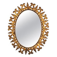 Sunburst Oval Mirror in Gilt Metal, Scroll and Leaf Motif, Spain, 1950s