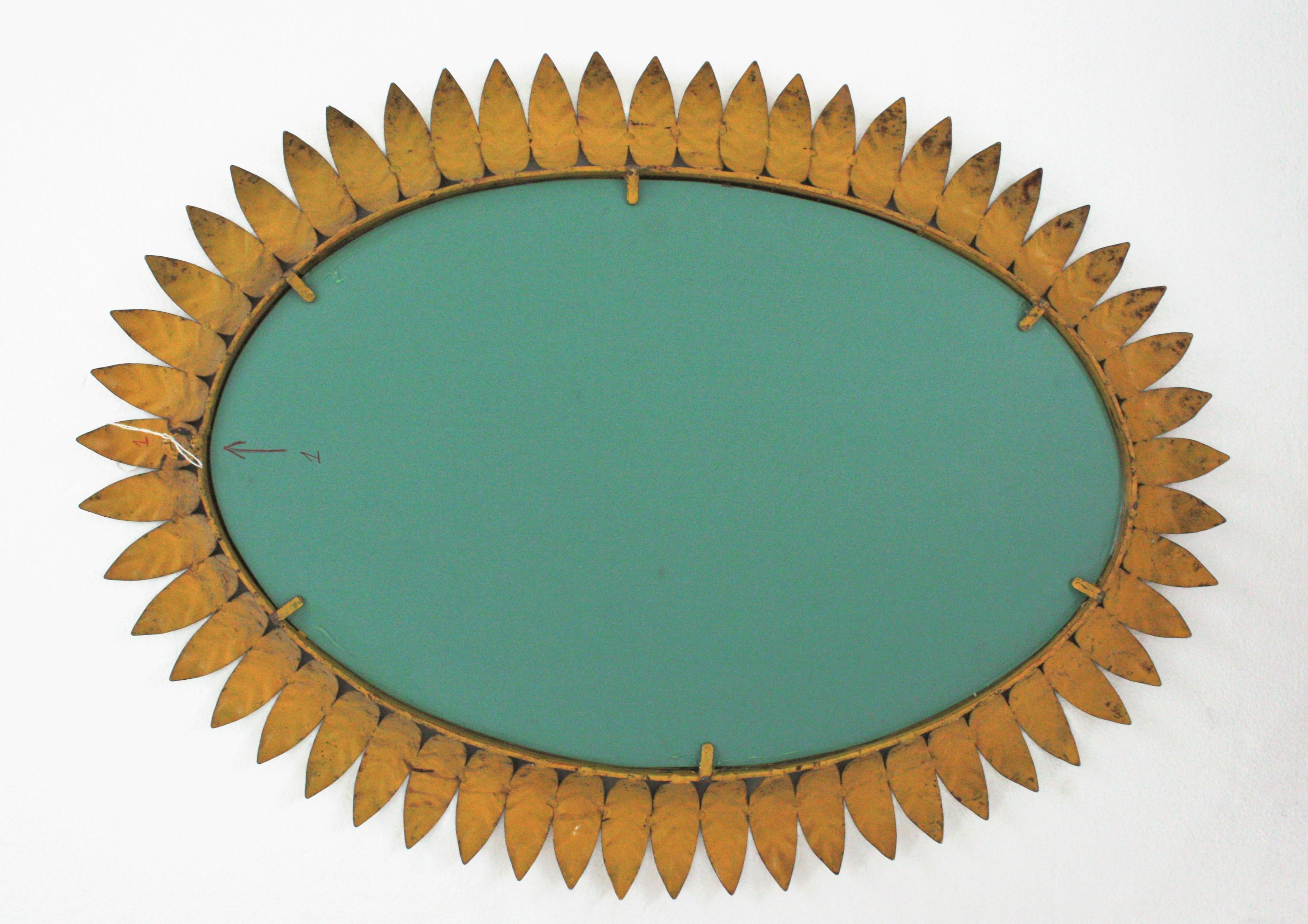 1950s Sunburst Oval Mirror in Gilt Metal For Sale 4