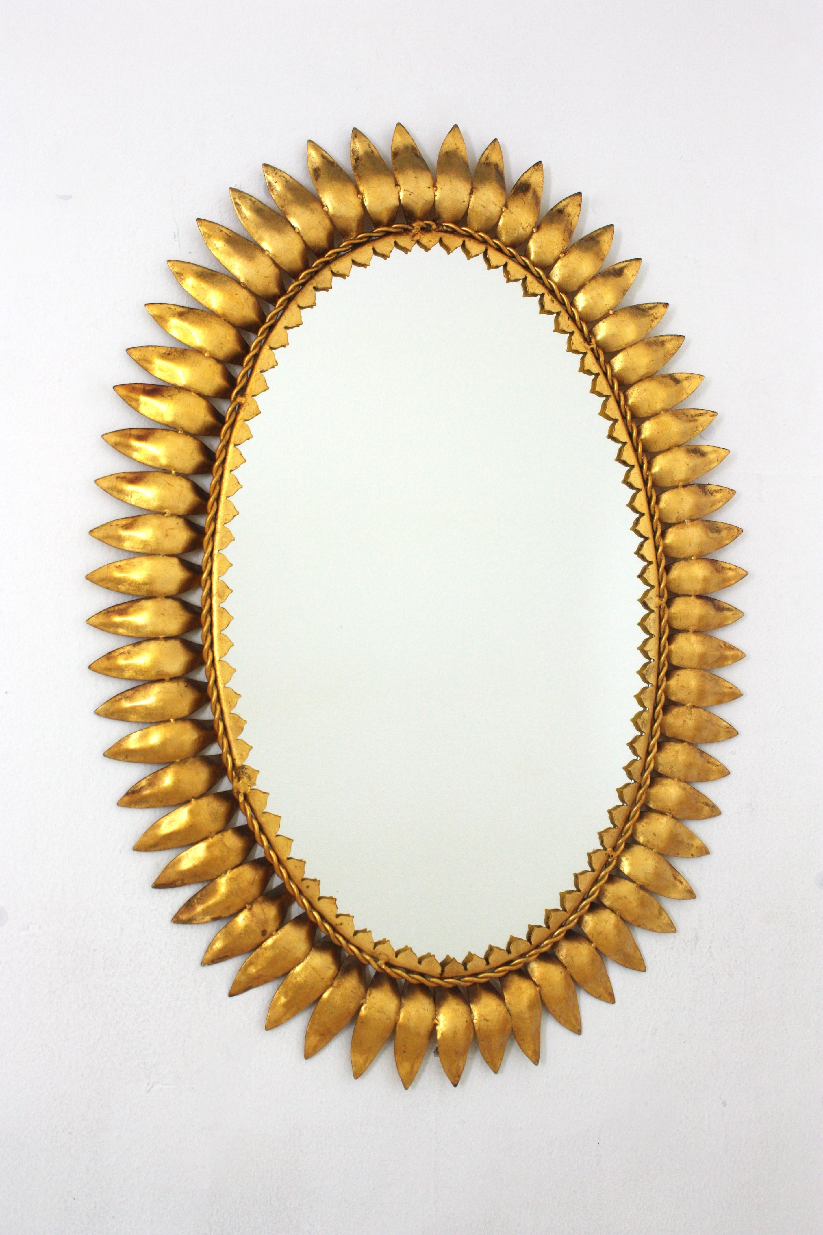 Mid-Century Modern Sunburst Oval Mirror in Gilt Metal, Spain, 1950s For Sale