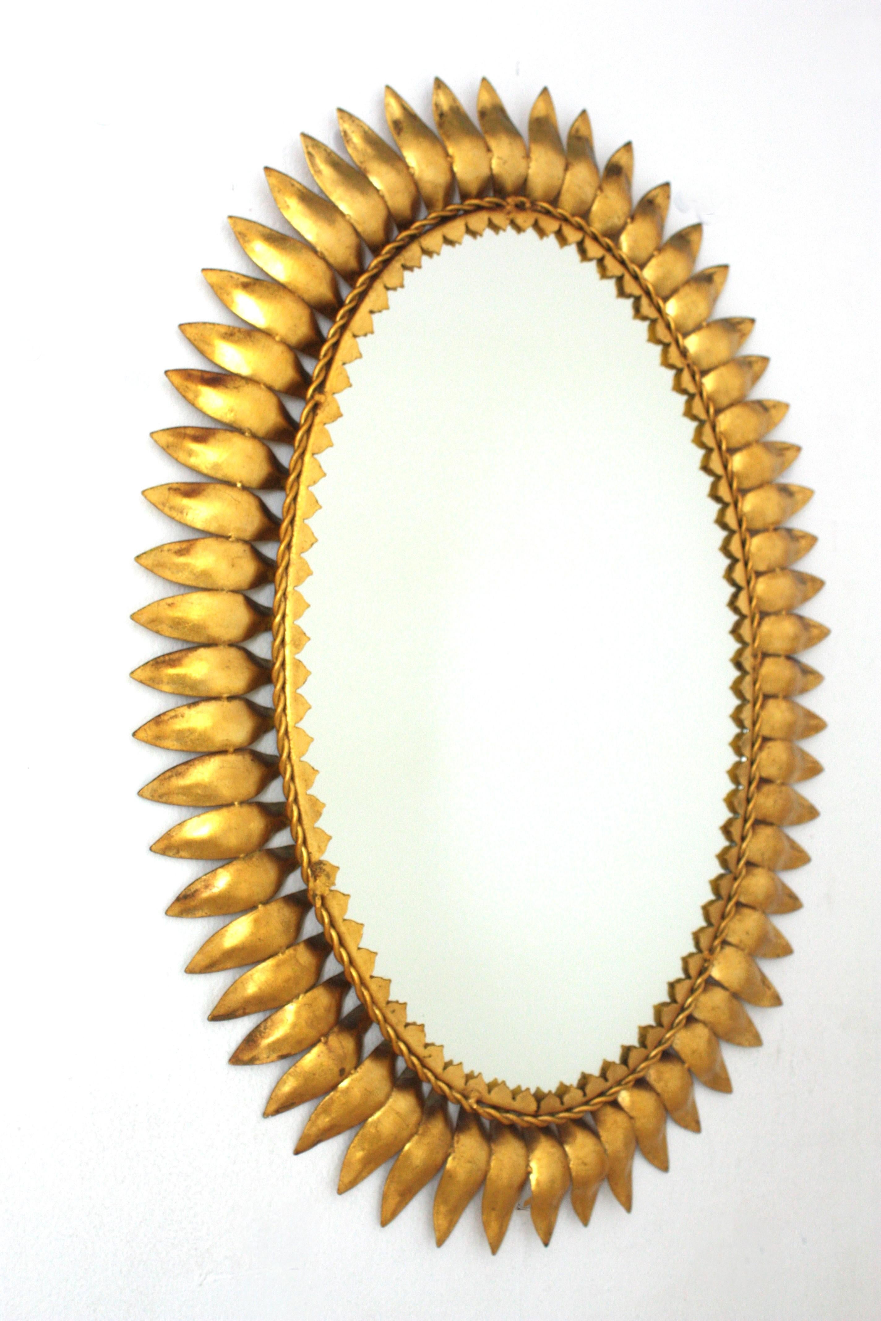 Spanish Sunburst Oval Mirror in Gilt Metal, Spain, 1950s For Sale