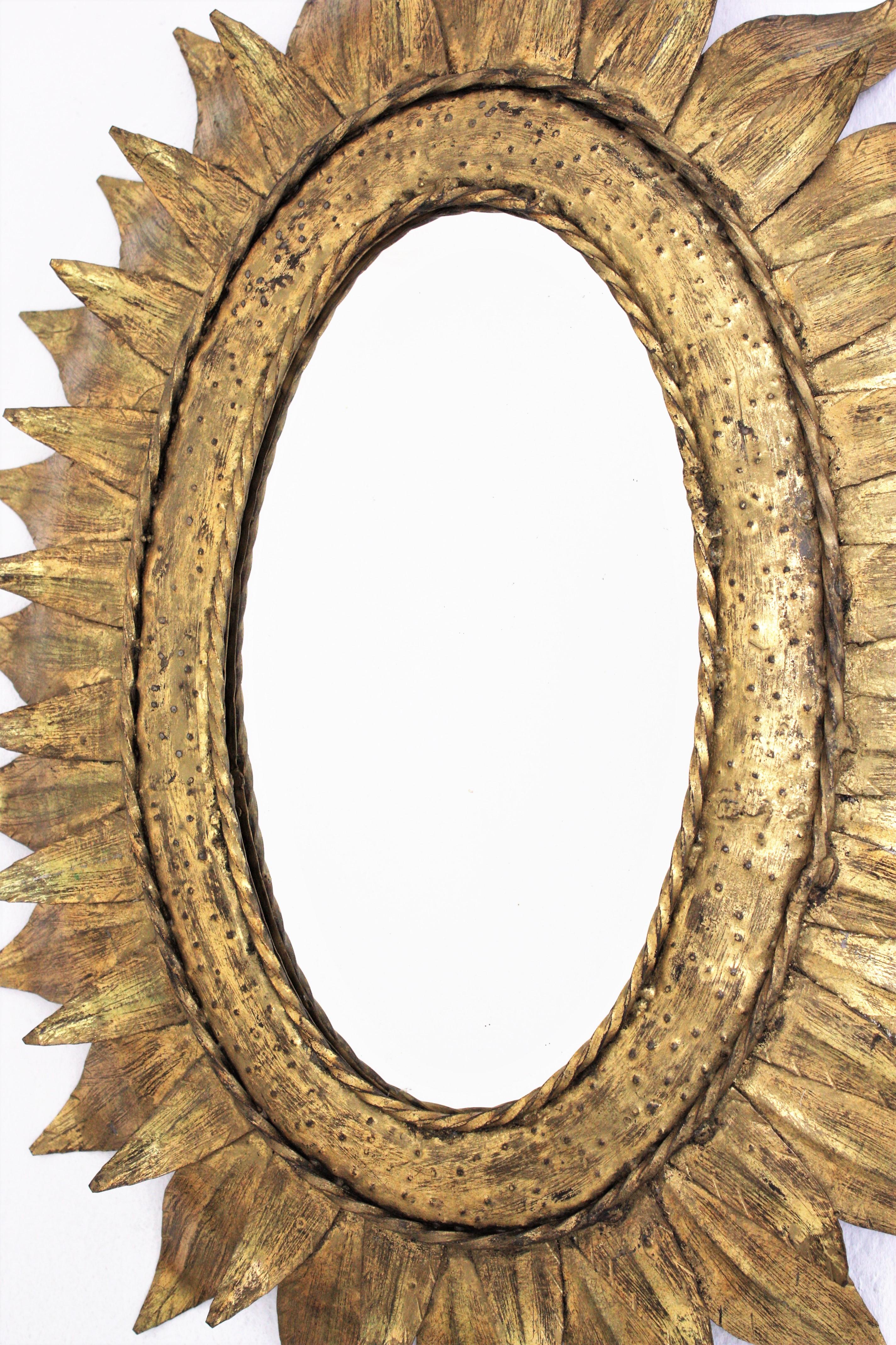 French Sunburst Oval Mirror in Gilt Metal with Double Leafed Frame For Sale 3