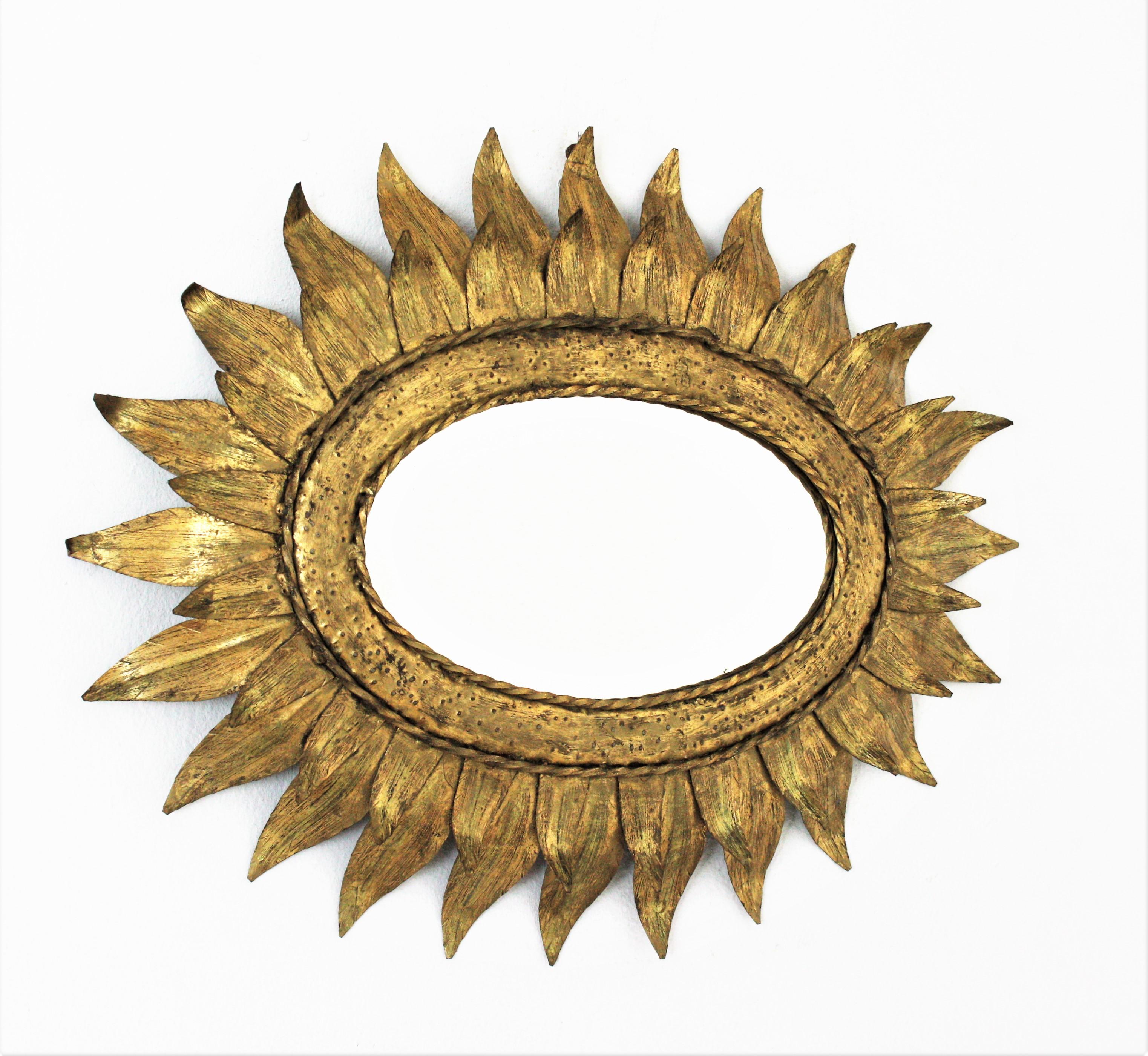 French Sunburst Oval Mirror in Gilt Metal with Double Leafed Frame For Sale 4