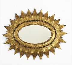 French Sunburst Oval Mirror in Gilt Metal with Double Leafed Frame, 1950s
