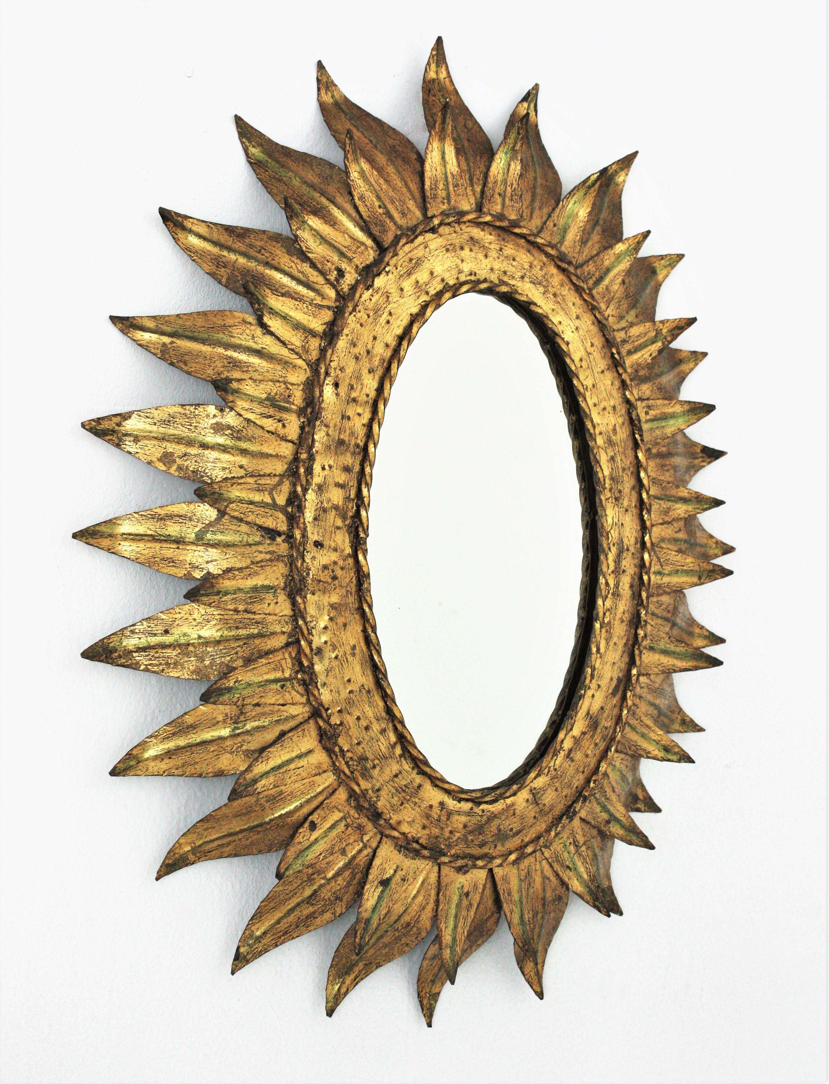 Mid-Century Modern Sunburst Oval Mirror in Gilt Metal with Double Leafed Frame, France, 1950s