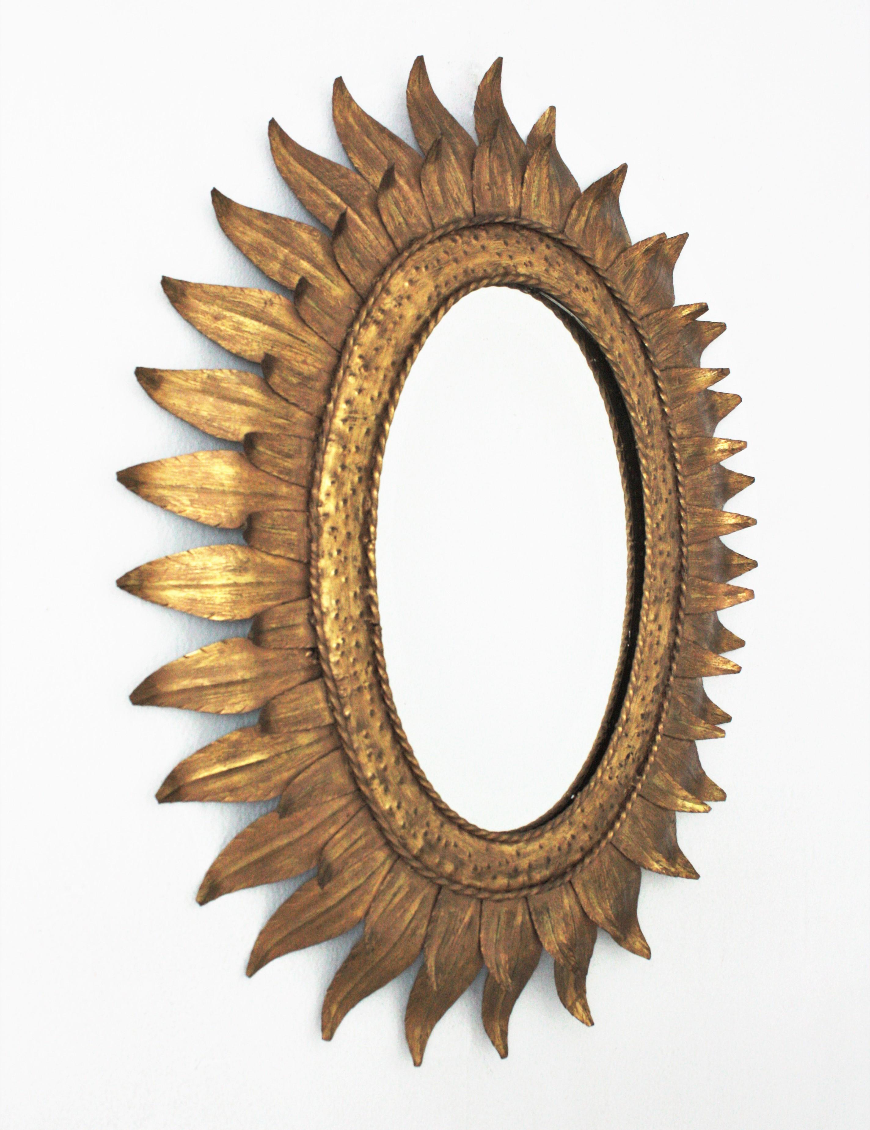 French Sunburst Oval Mirror in Gilt Metal with Double Leafed Frame, France, 1950s 