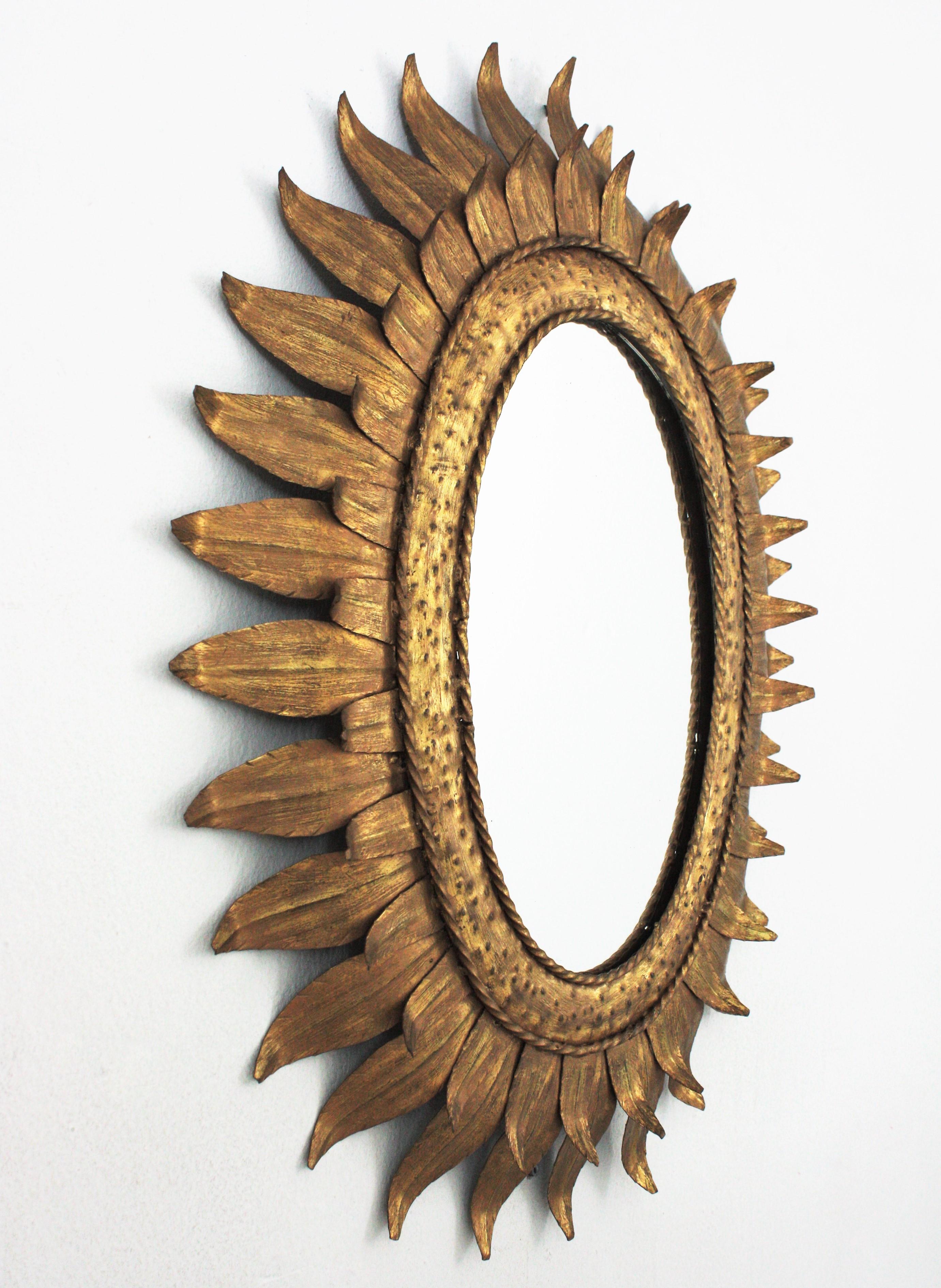 Hand-Crafted Sunburst Oval Mirror in Gilt Metal with Double Leafed Frame, France, 1950s 