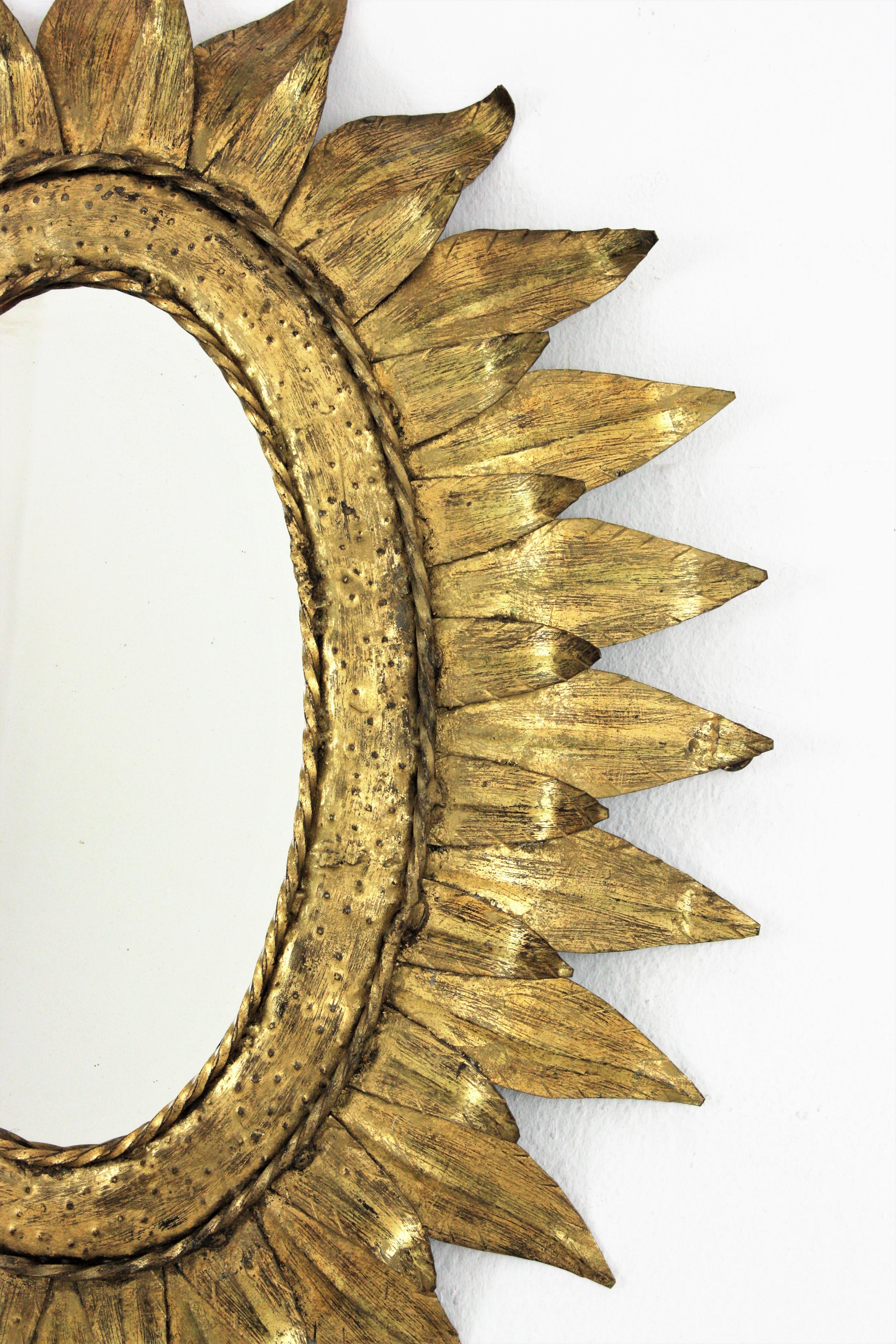 20th Century French Sunburst Oval Mirror in Gilt Metal with Double Leafed Frame For Sale