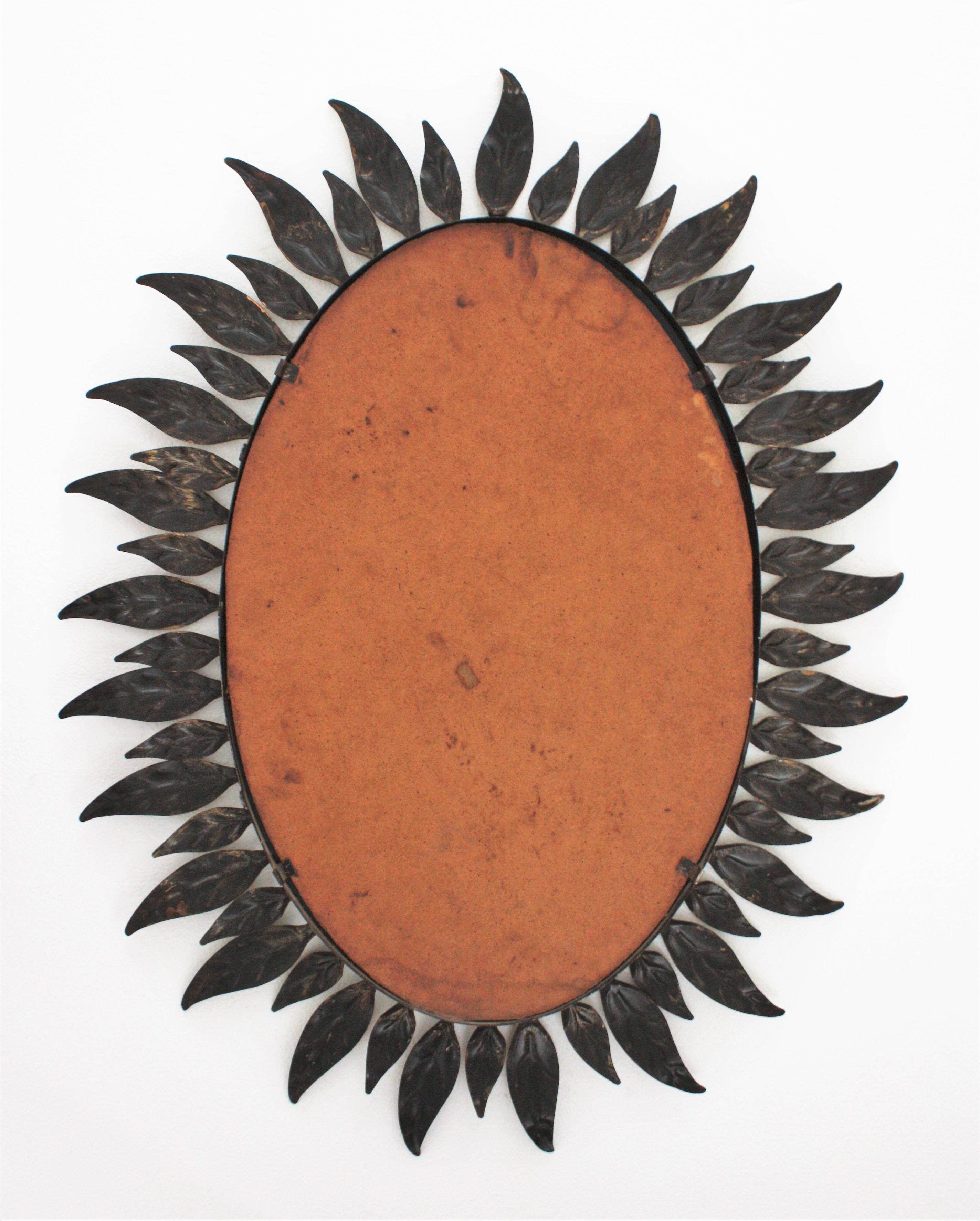 Spanish Sunburst Oval Mirror in Gilt Metal with Leafed Frame For Sale 6