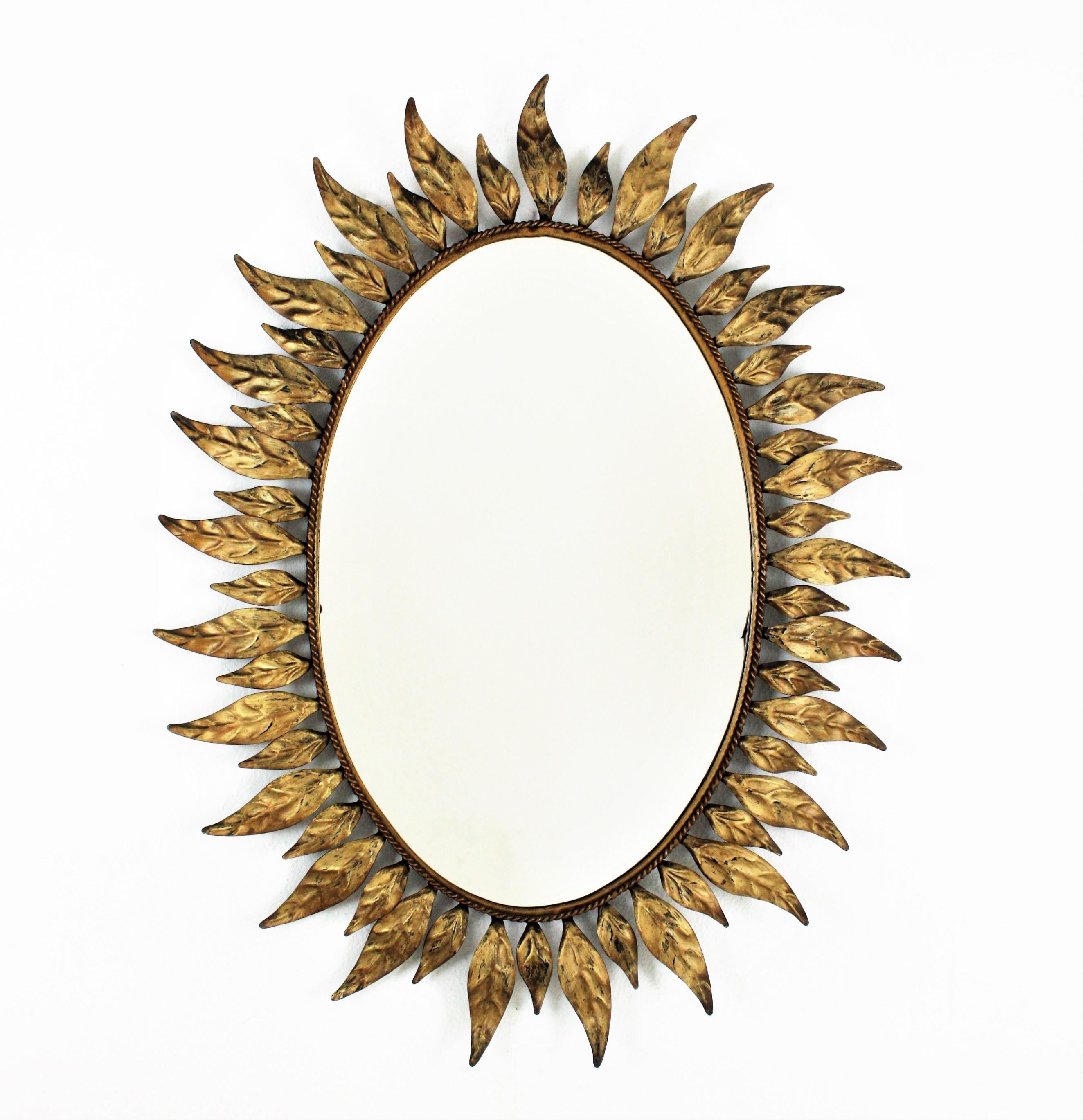 Spanish Sunburst Oval Mirror in Gilt Metal with Leafed Frame For Sale 7