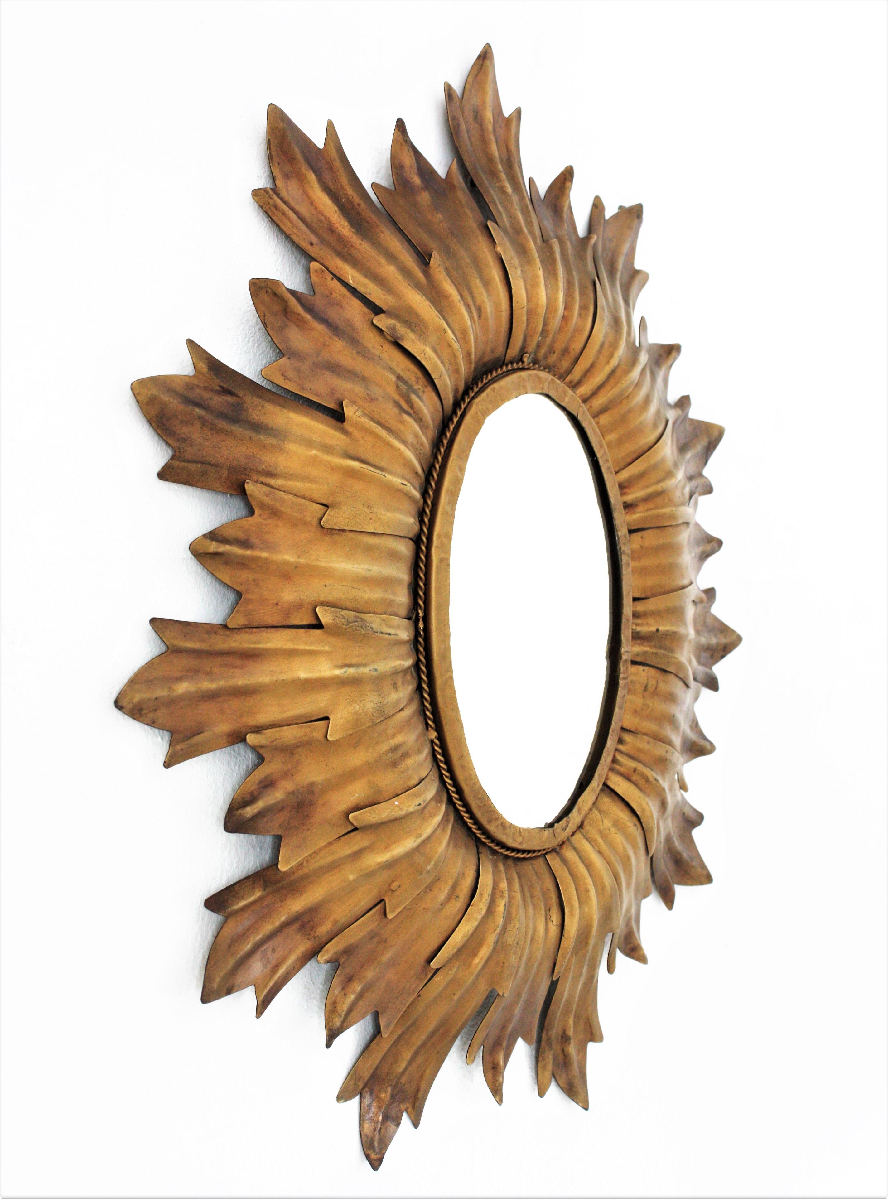 French Sunburst Oval Mirror in Gilt Metal with Leafed Frame, France, 1960s For Sale